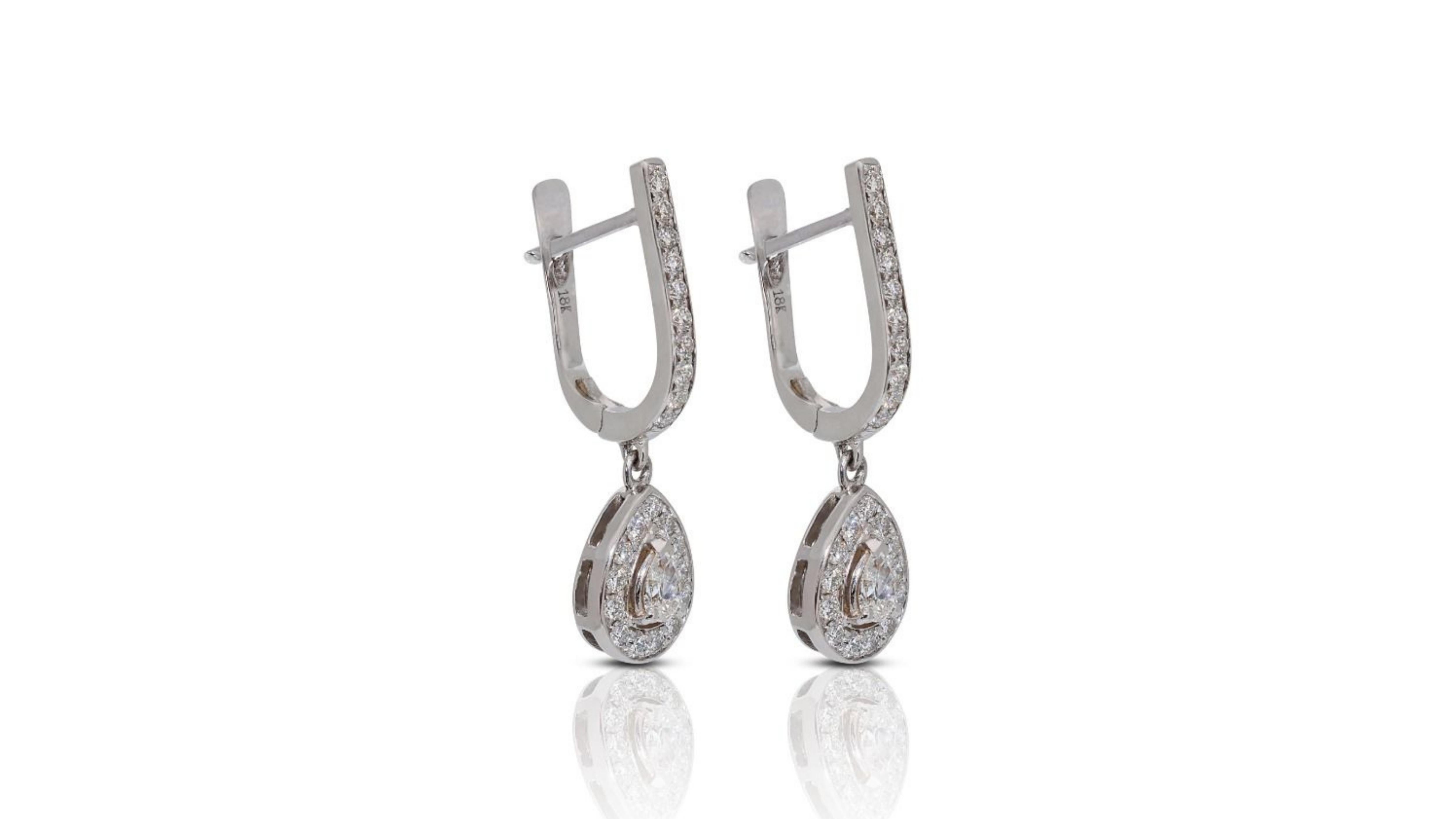 Pear Cut Elegant 18k White Gold .38ct. Pear Brilliant Dangling Diamond Earrings For Sale
