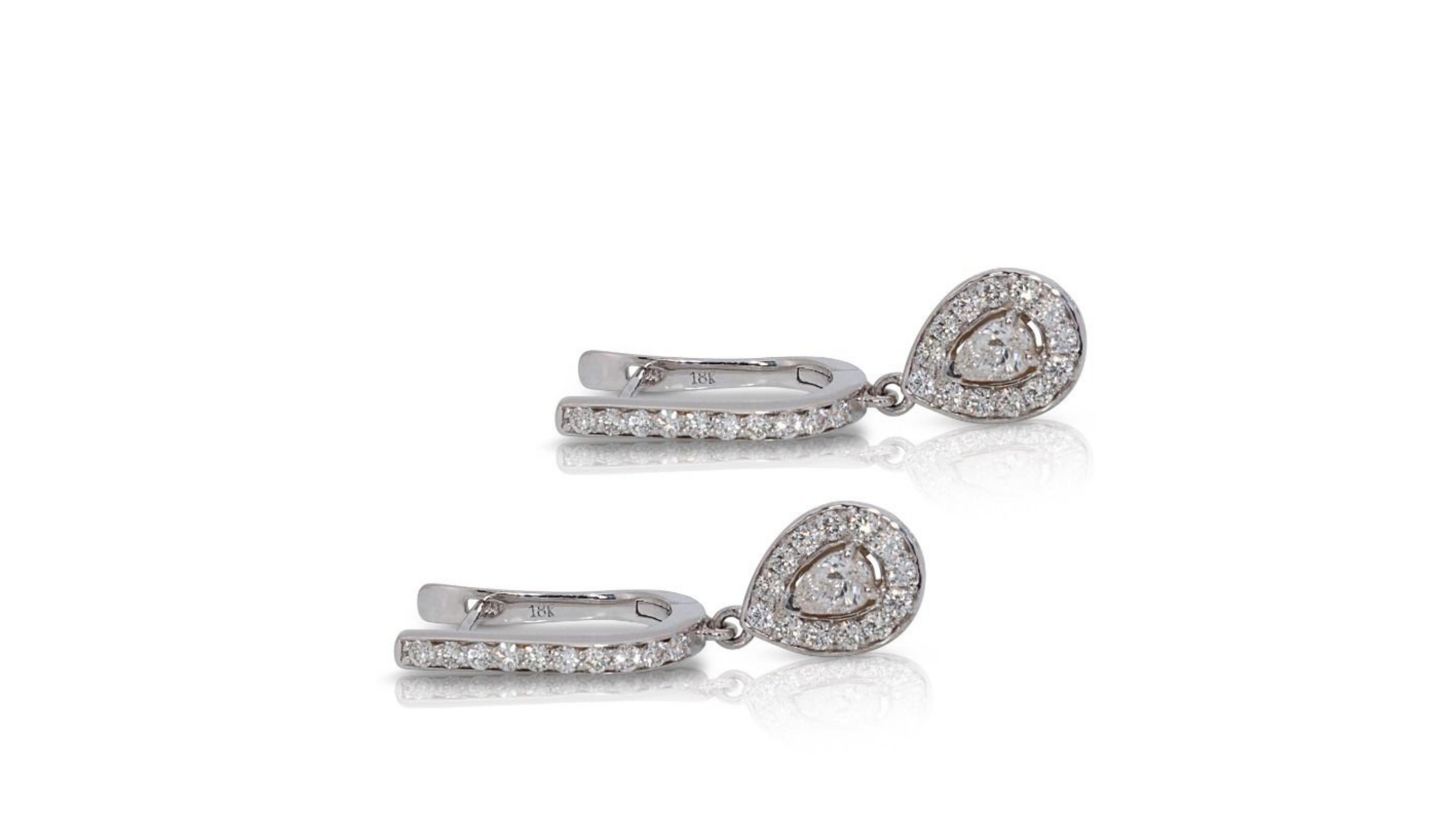 Elegant 18k White Gold .38ct. Pear Brilliant Dangling Diamond Earrings In New Condition For Sale In רמת גן, IL
