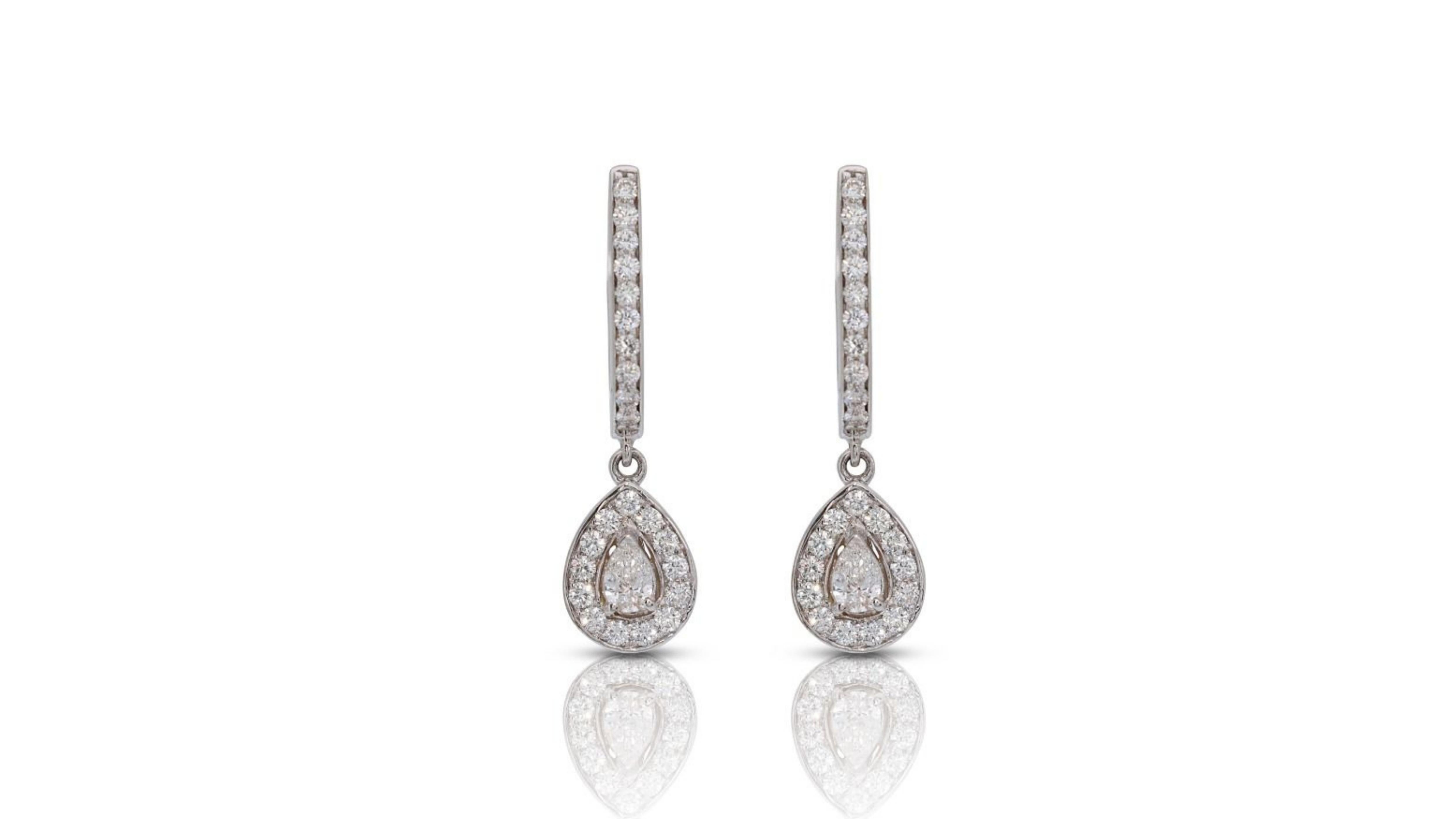 Elegant 18k White Gold .38ct. Pear Brilliant Dangling Diamond Earrings For Sale 1