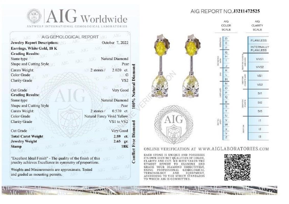 Stunning and one of a kind earrings made from 18k white gold with 2.59 total carat of pear shaped diamonds canary and white pears. 
This earring comes with an AIG report and a fancy box.


-2 diamond main stone of 1.01 ct. each, total: 2.02 ct.
Cut: