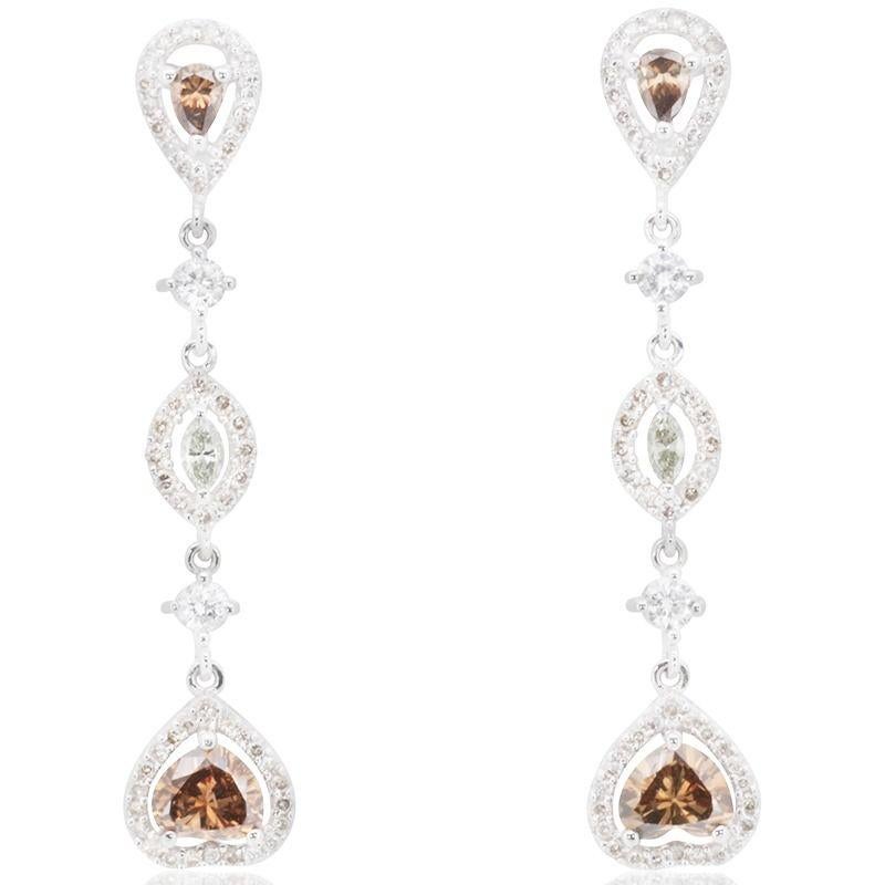A beautiful earring with a dazzling 0.16 carat heart shape natural diamonds. It has 1.48 carat of side diamonds which add more to its elegance. The jewelry is made of 18k white gold with a high quality polish. It comes with NGI certificate and a