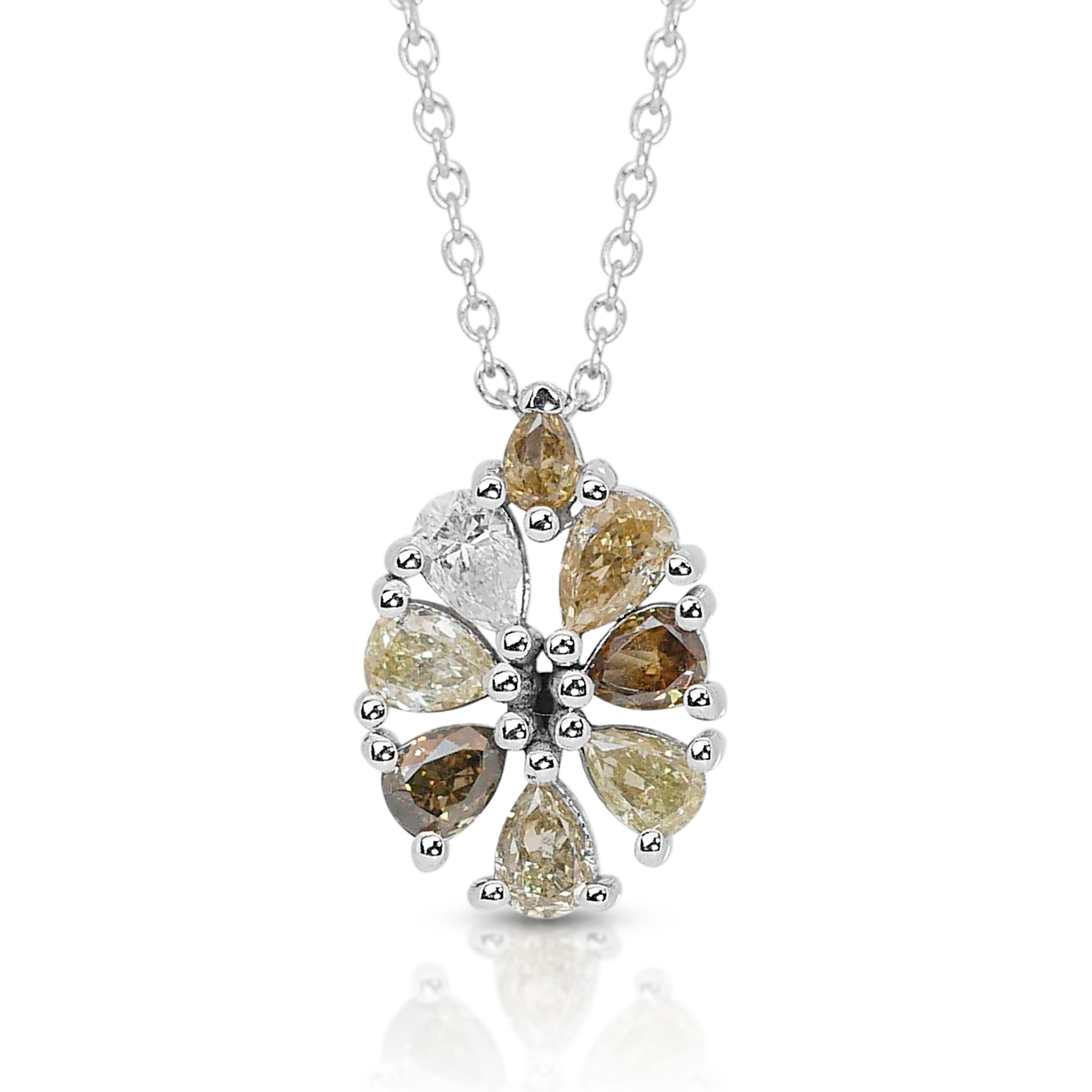 Elegant 18k White Gold Natural Diamond Necklace with Pendant w/0.90 ct - IGI Certified

A captivating 18k white gold diamond necklace featuring a unique display of 0.90 total carat weight pear-shaped diamonds. The necklace showcases a beautiful