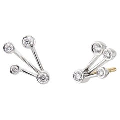 Elegantes pendientes de oro blanco de 18 quilates con diamantes talla brillante