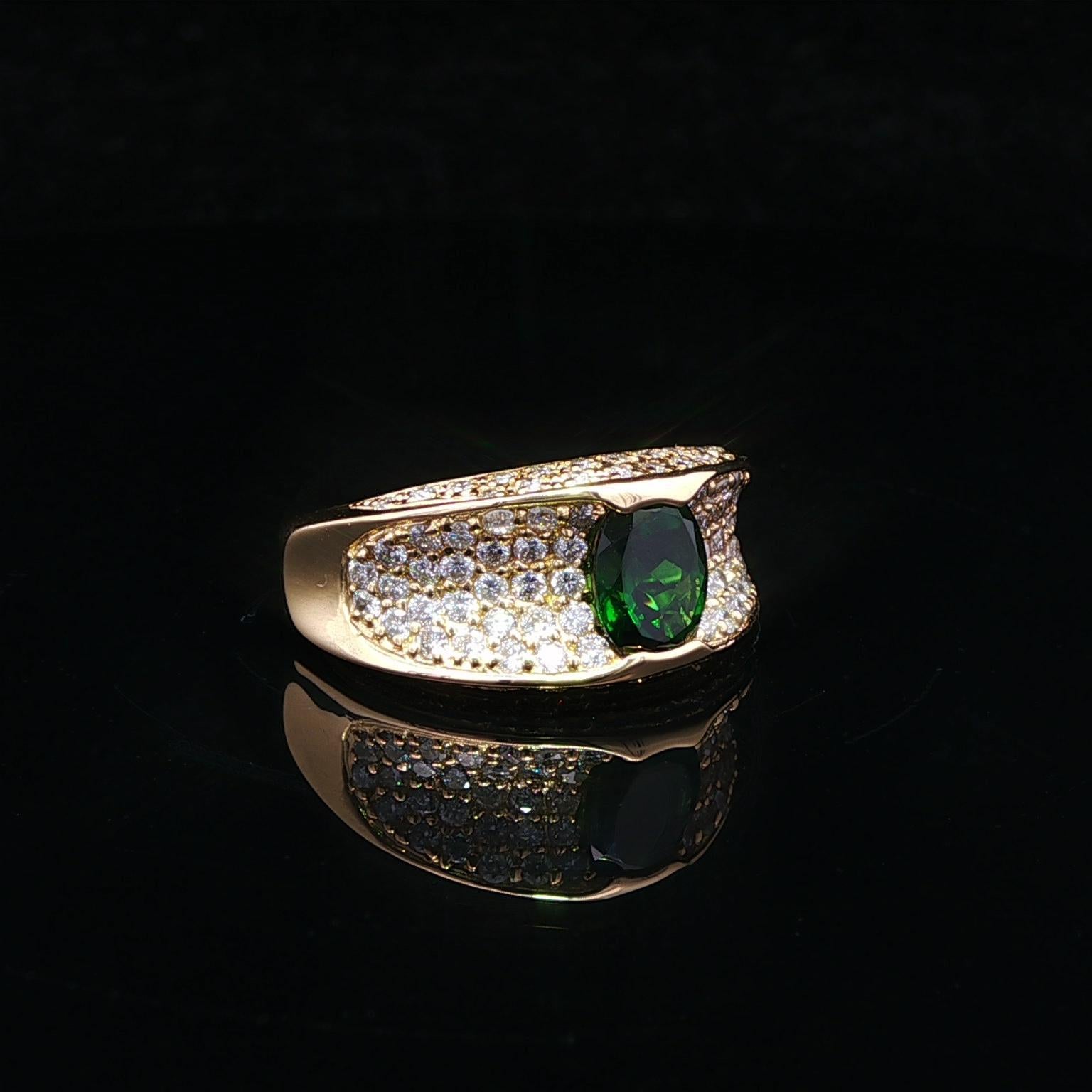 --Pietre: --
(1) Tsavorite naturale autentica - taglio ovale - incastonata - colore Greene & Greene profondo - 1,2ct (esatto)
Numerosi diamanti naturali autentici - taglio rotondo a brillante - incastonati - bei diamanti bianchi a brillante -