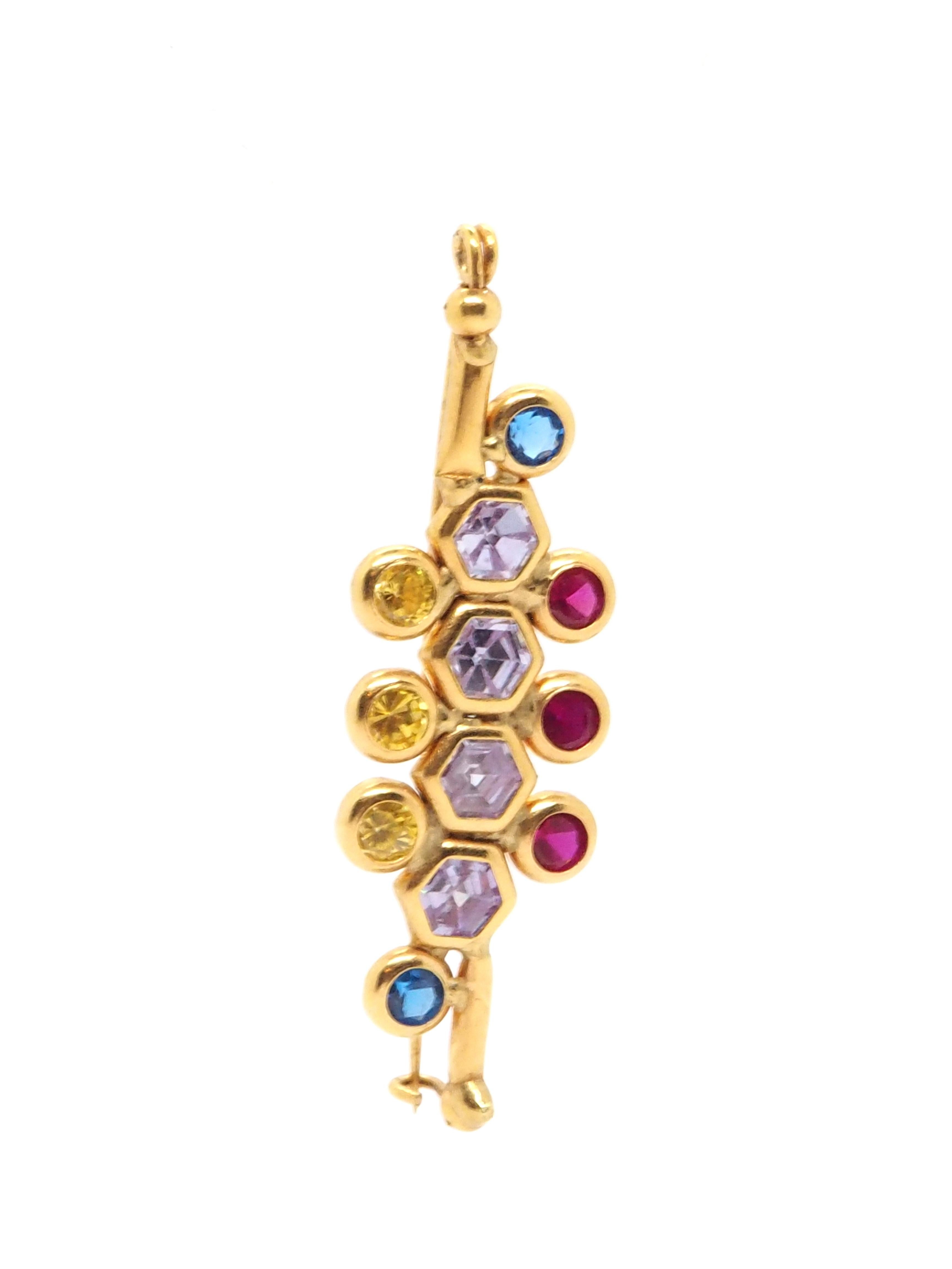 Introducing our exquisite Elegant Brooch, meticulously crafted in 18k yellow gold and adorned with a captivating assortment of precious gemstones. 

Indulge in the allure of this one-of-a-kind piece, designed to elevate your style and make a