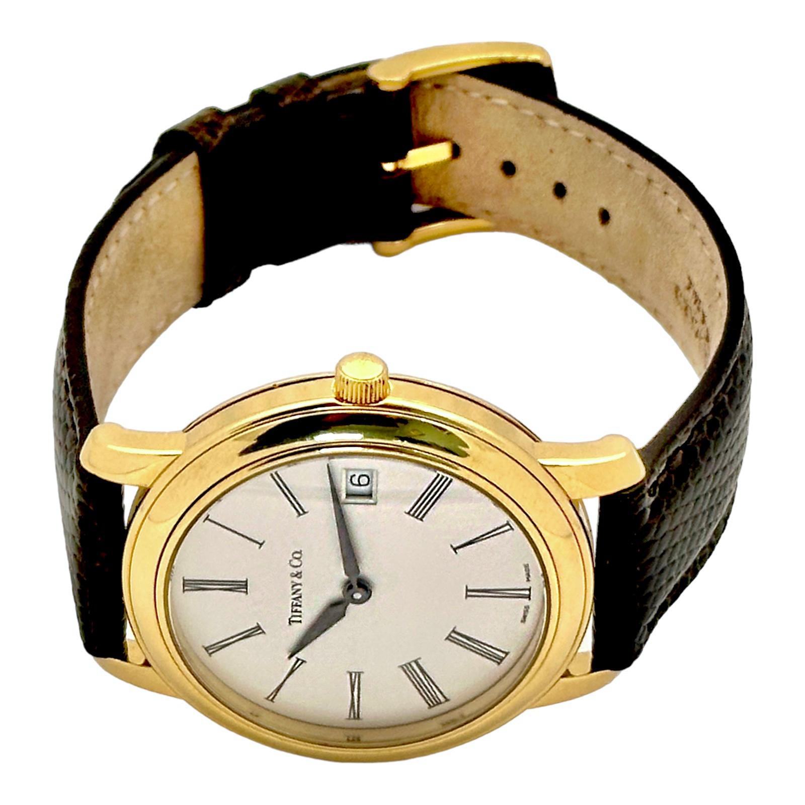 Eleganter Herren aus 18 Karat Gelbgold Tiffany & Co. Quarzwerk Armbanduhr  (Moderne) im Angebot