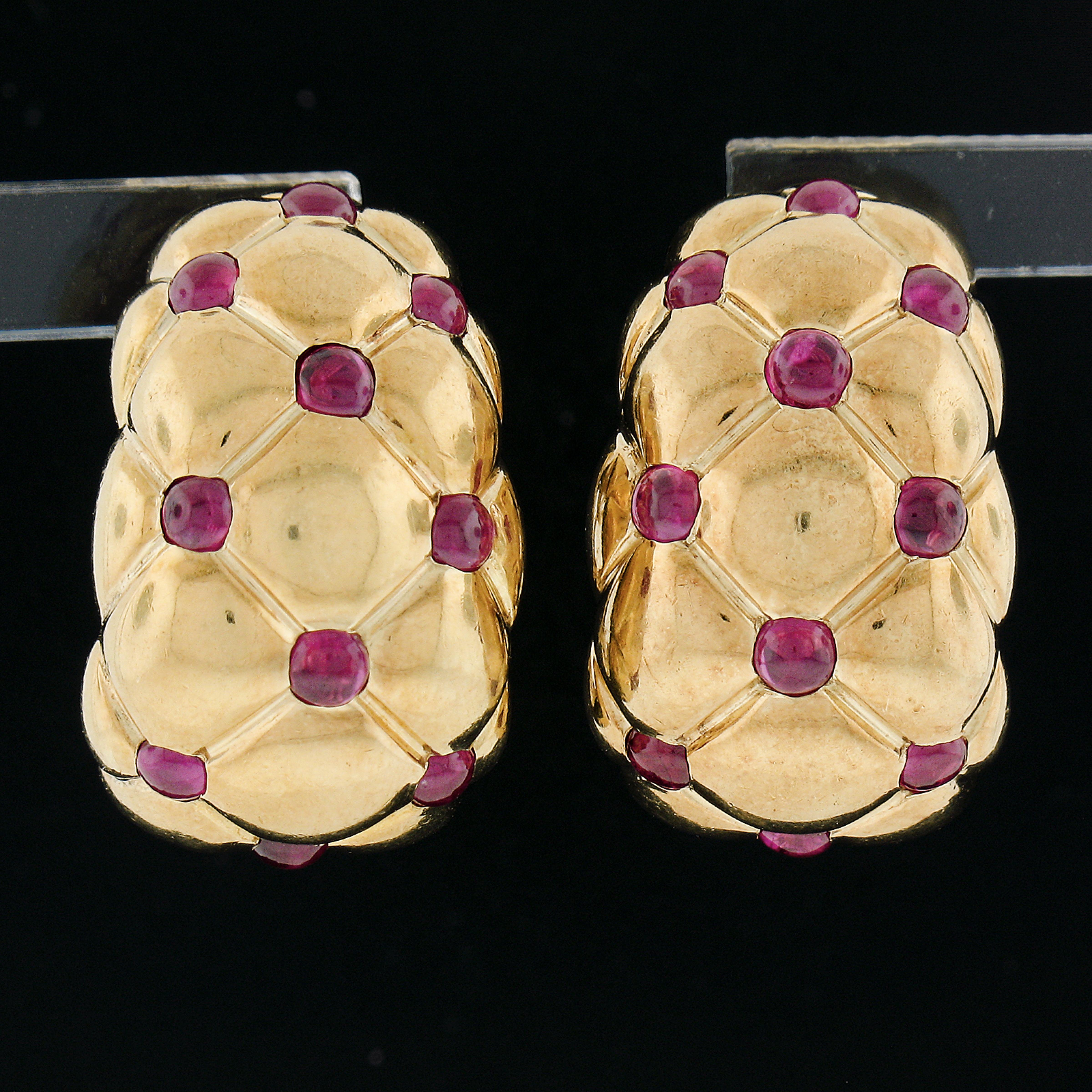 --Stone(s):--
(20) Natural Genuine Rubies - Round Cabochon Cut - Flush/Burnish Set - Vivid Deep Red Color - 2.3mm each (approx.)

Material: 18K Solid Yellow Gold
Weight: 14.54 Grams
Backing: Post Backings w/ Omega Closures (pierced ears are