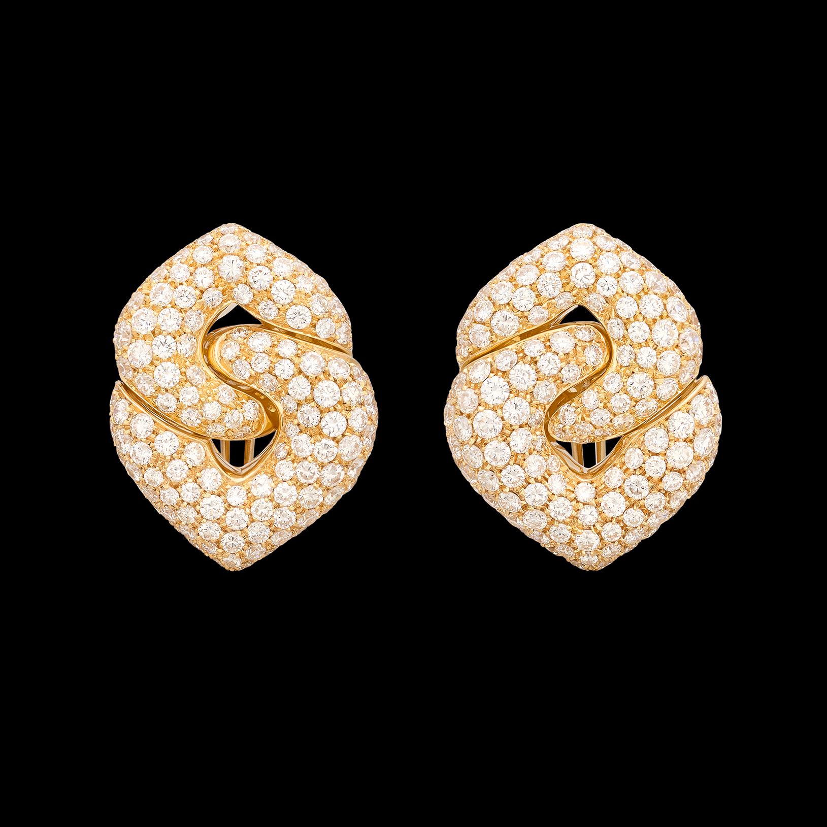 If you're looking for a piece of jewelry where elegance and style meet, then look no further. These stunning diamond drop earrings feature approximately 268 incredibly fine white natural diamonds weighing a total of 8.32 carats (diamonds averaging