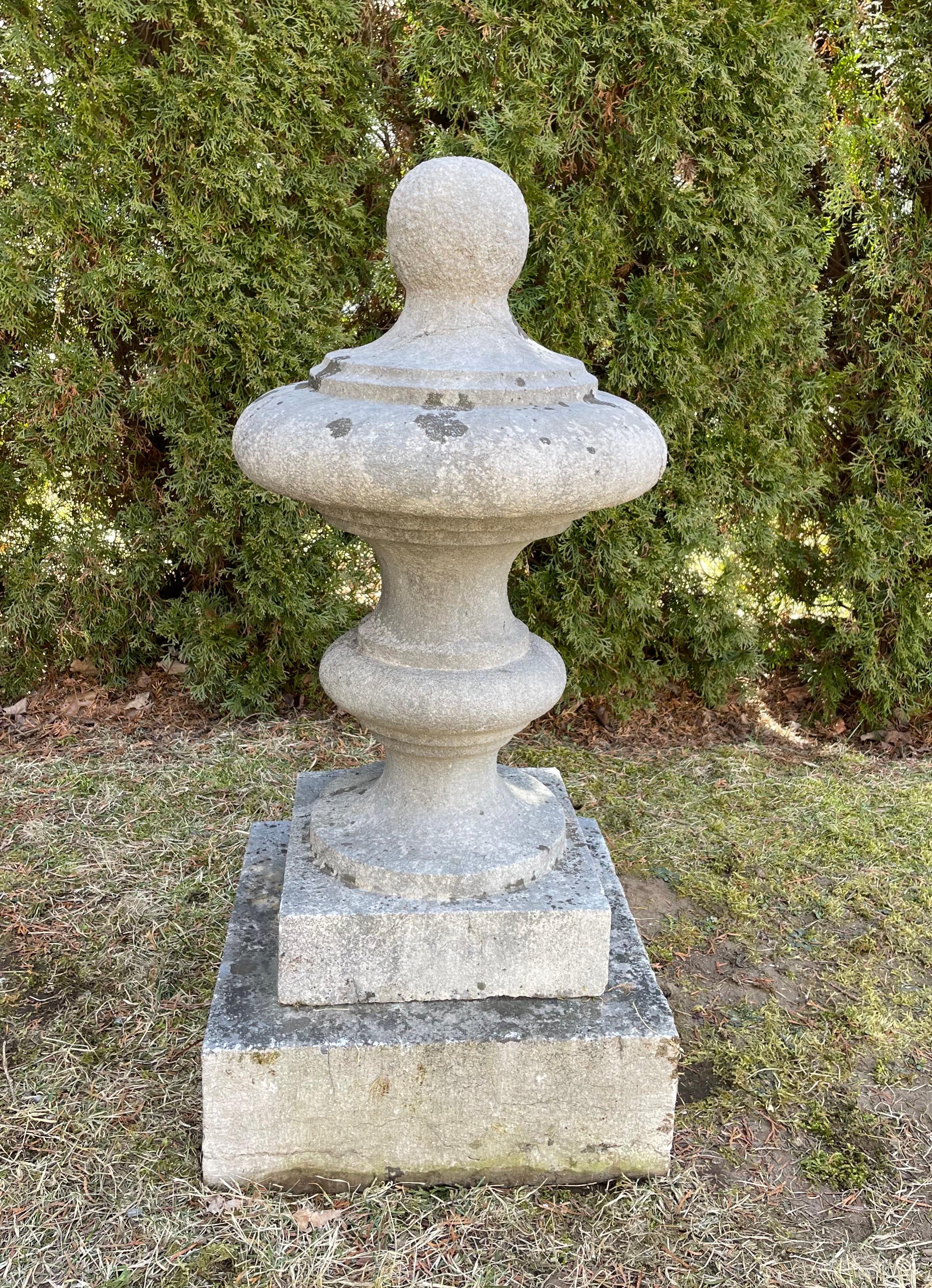 We bought this hand-carved bluestone finial along with four massive flame ones and it once graced a private castle just outside of Nemur, Belgium. Pale gray in color with a lightly lichened surface and with an elegant urn-form, it makes a stunning