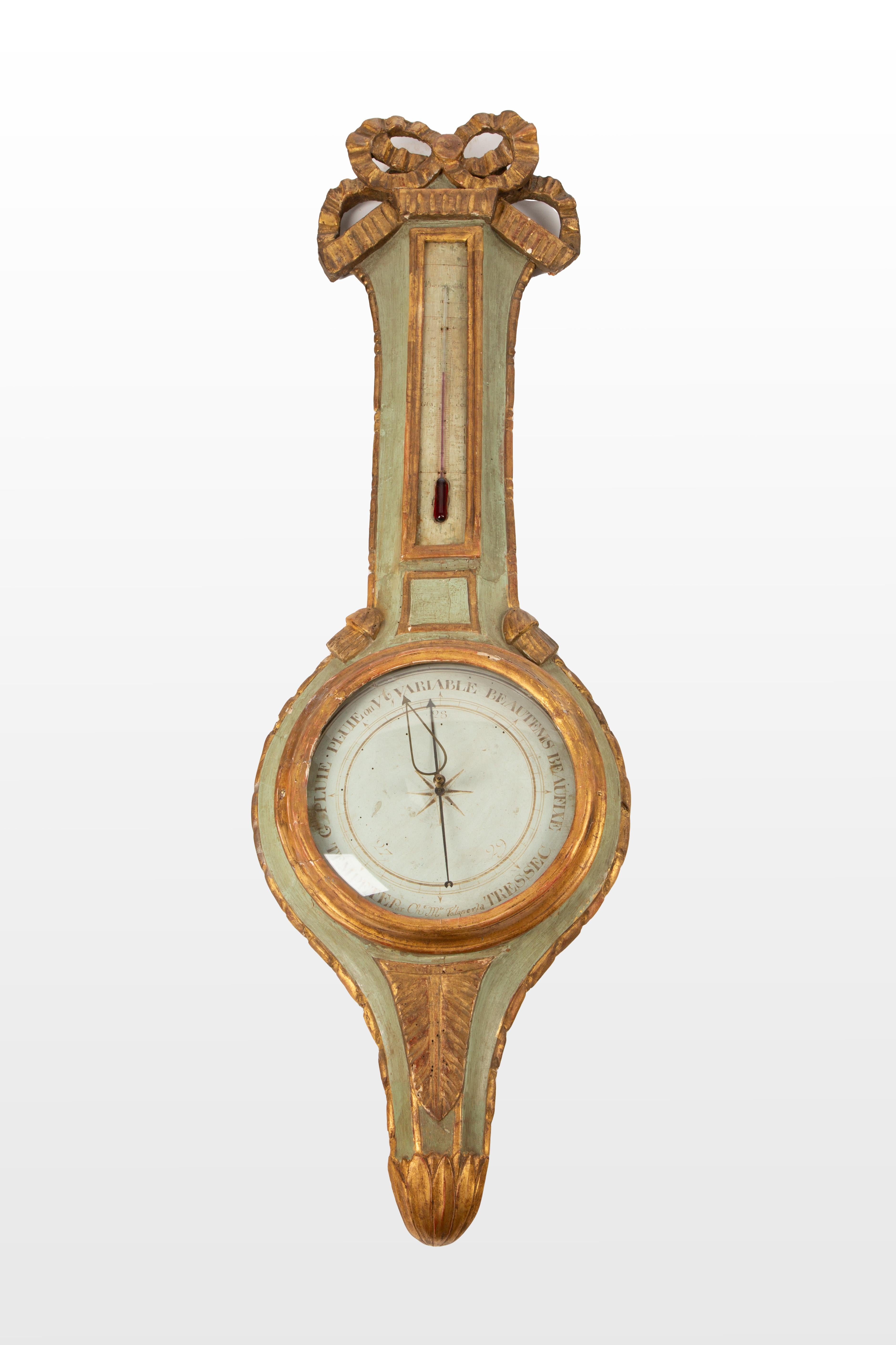 A stunning 18th-century French barometer crafted with exquisite giltwood and painted detailing, this piece embodies the elegance and craftsmanship of its time. Featuring a beautifully hand-carved ribbon crest and delicate gold leaf accents, the