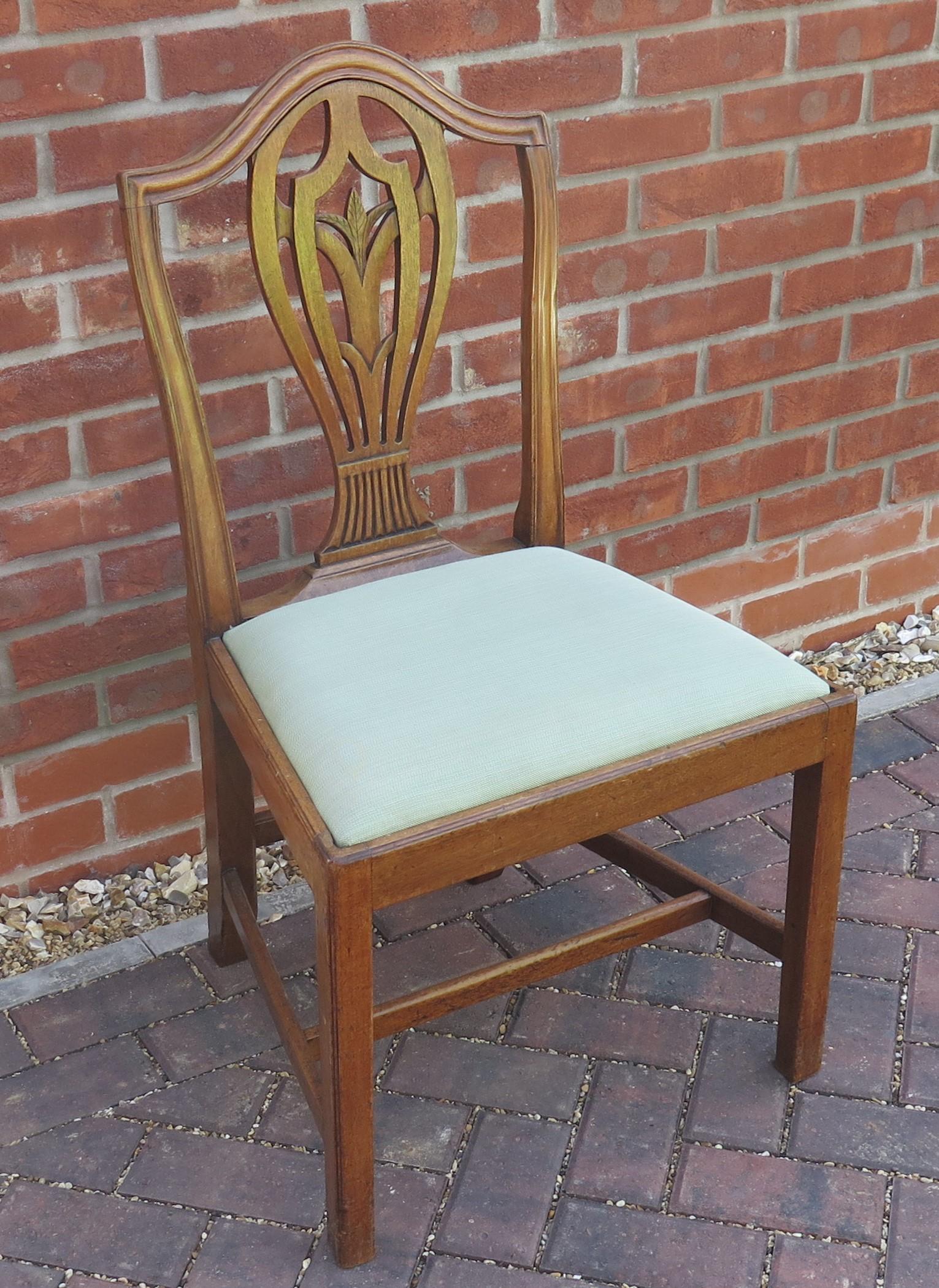 This is a very elegant, good quality Side or Dining Chair from the late 18th Century period, circa 1785. 

Camel back chairs of this date are popularly called Hepplewhite because very many chair makers followed the designs of George Hepplewhite,