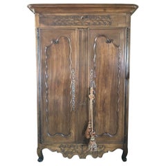 Elegant 19th Century Louis XV French Carved Walnut Armoire