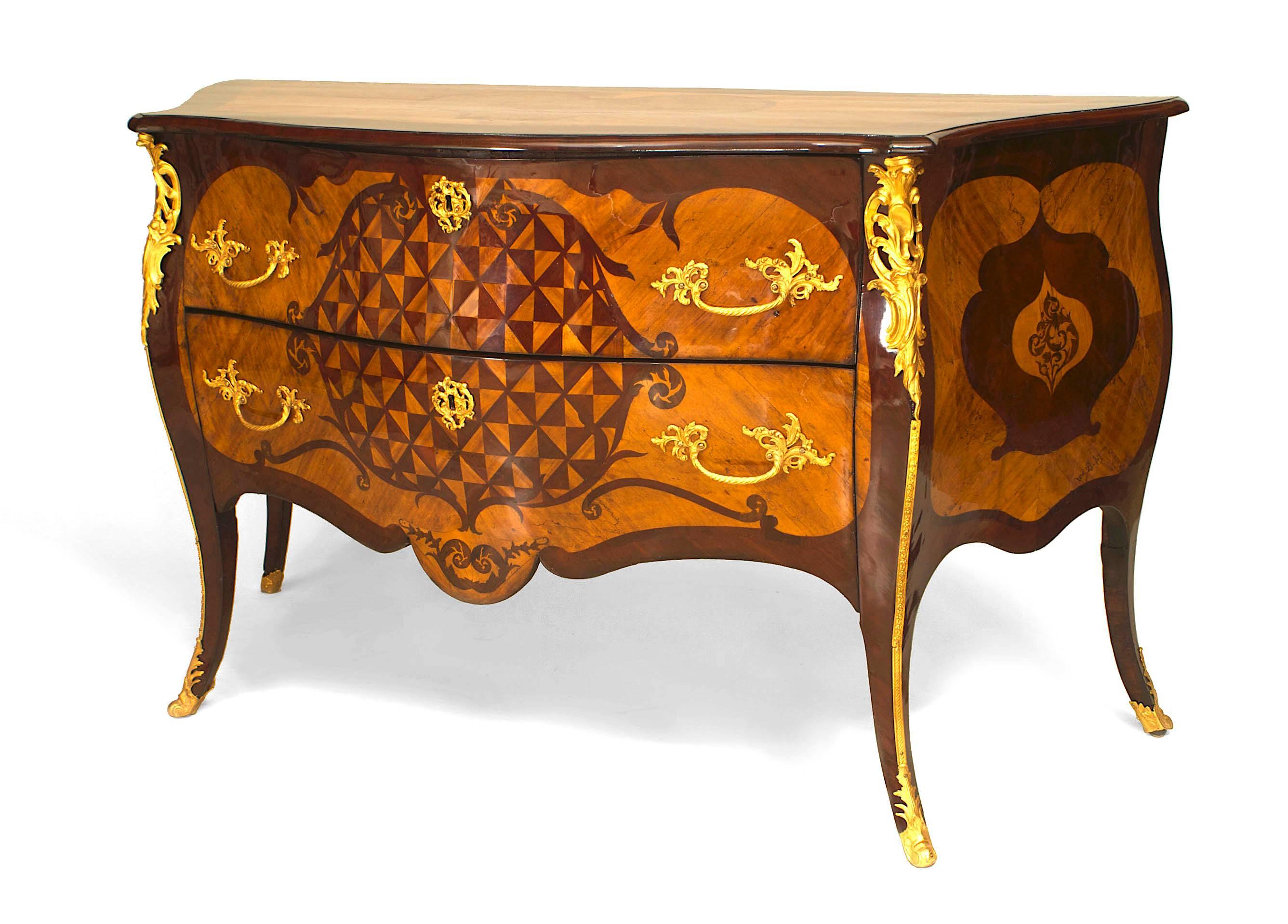 Continental (probably Dutch, circa 1750) Rococo gilt bronze trimmed mahogany and fruitwood 2 drawer commode with parquetry and marquetry inlaid design.

