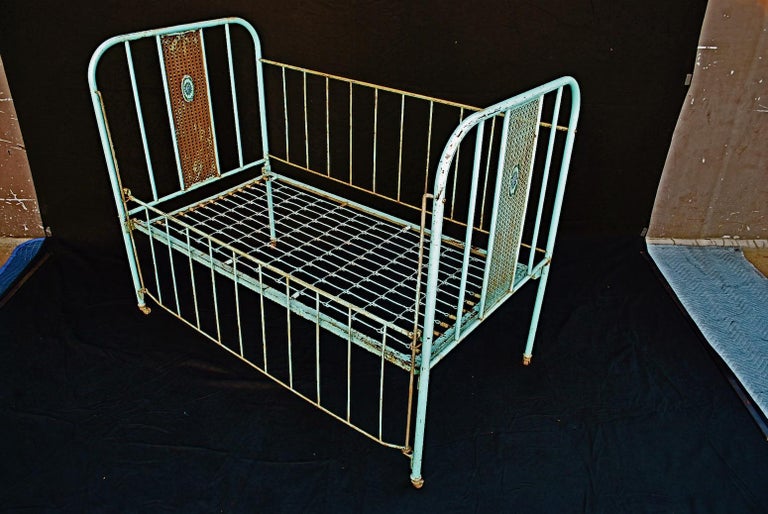 Antique metal baby crib on sale