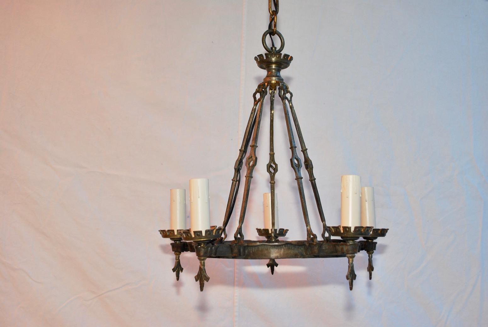 Beautiful 1920s cast iron/ brass chandelier.

 