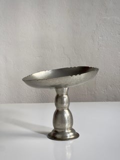 Elegant 1930s decorative compote bowl in hammered metal. Denmark 1930s