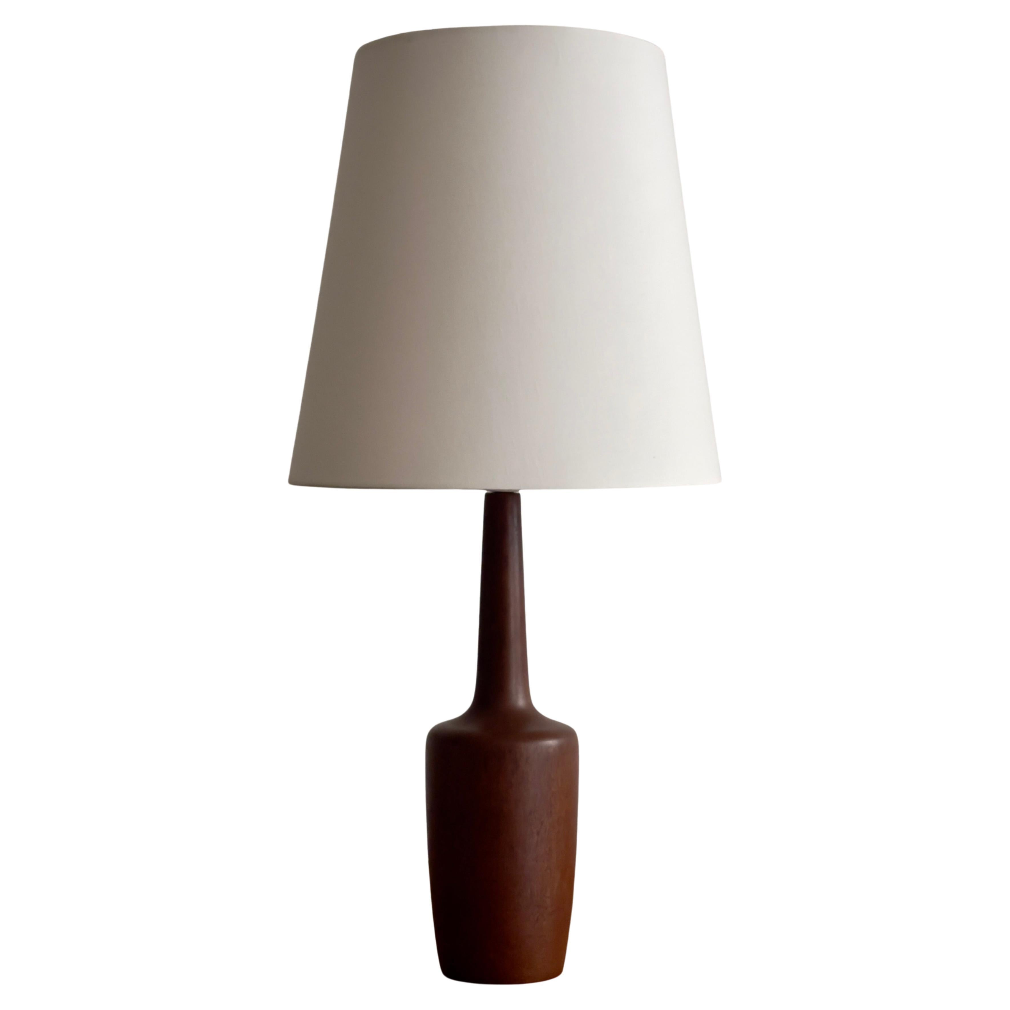 Elegant 1940s danish modern table lamp in high quality solid teak wood. For Sale