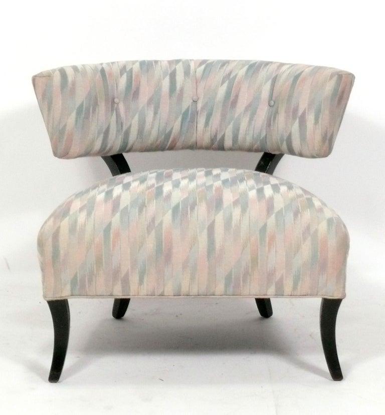 Curvaceous slipper lounge chair, American, circa 1940s. This chair is currently being refinished and reupholstered. You can choose the finish color, and it can be reupholstered in your fabric. Simply send us 5 yards of your fabric after purchase.