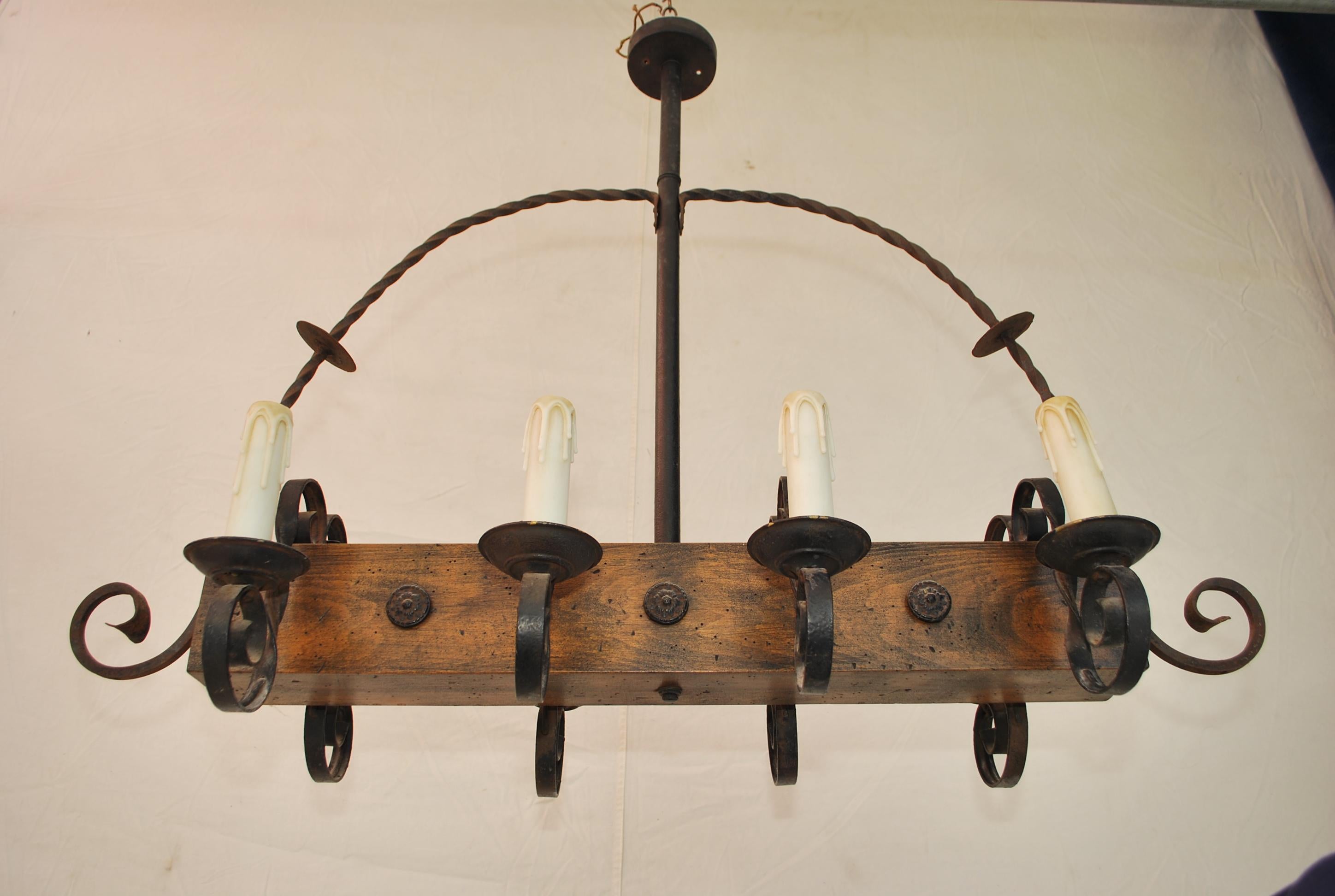 American Elegant 1940's Wood and Iron Chandelier For Sale