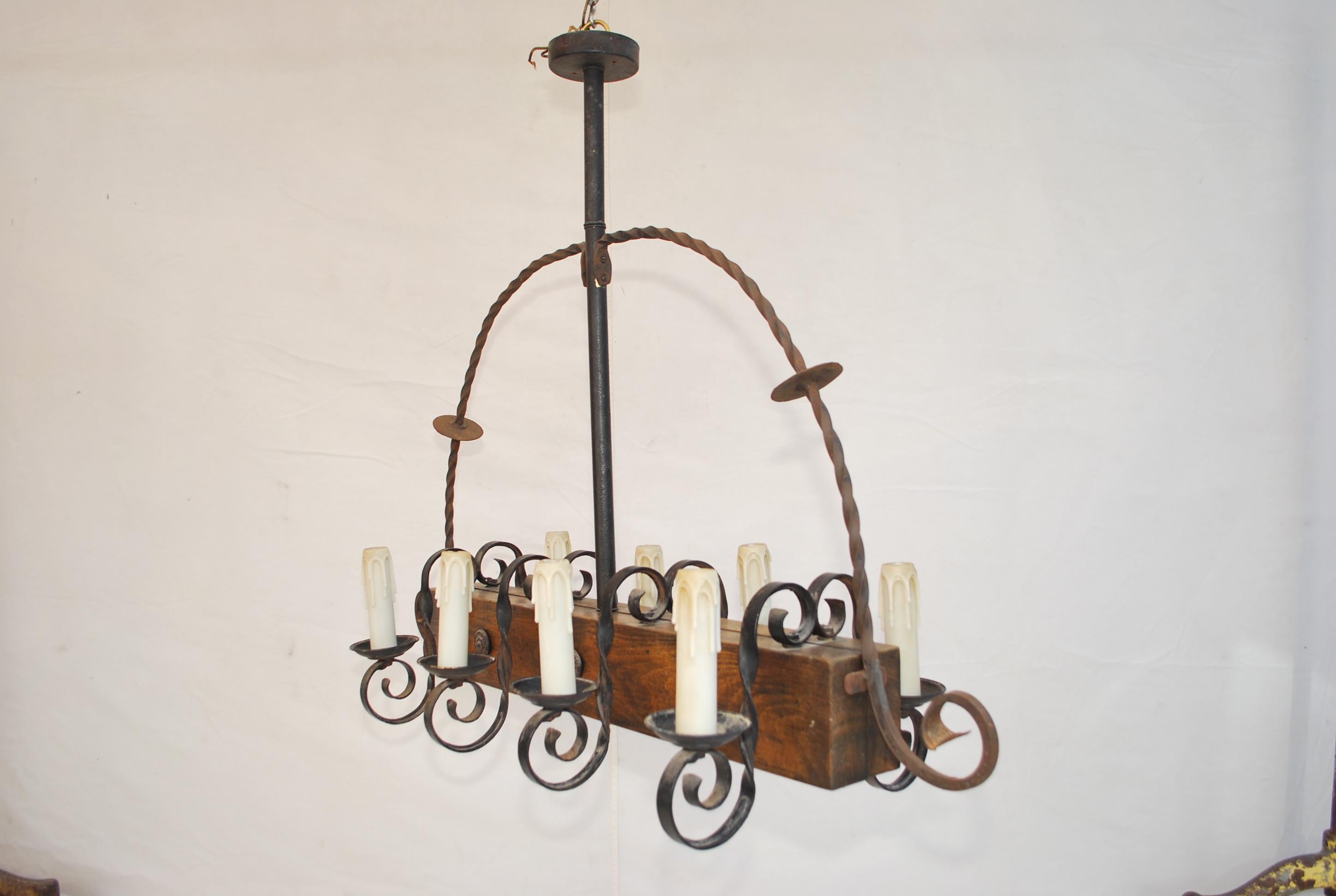 Elegant 1940's Wood and Iron Chandelier In Good Condition For Sale In Los Angeles, CA