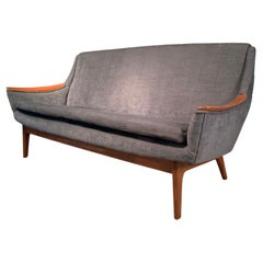 Elegant 1950's Danish Sofa with Teak Arms