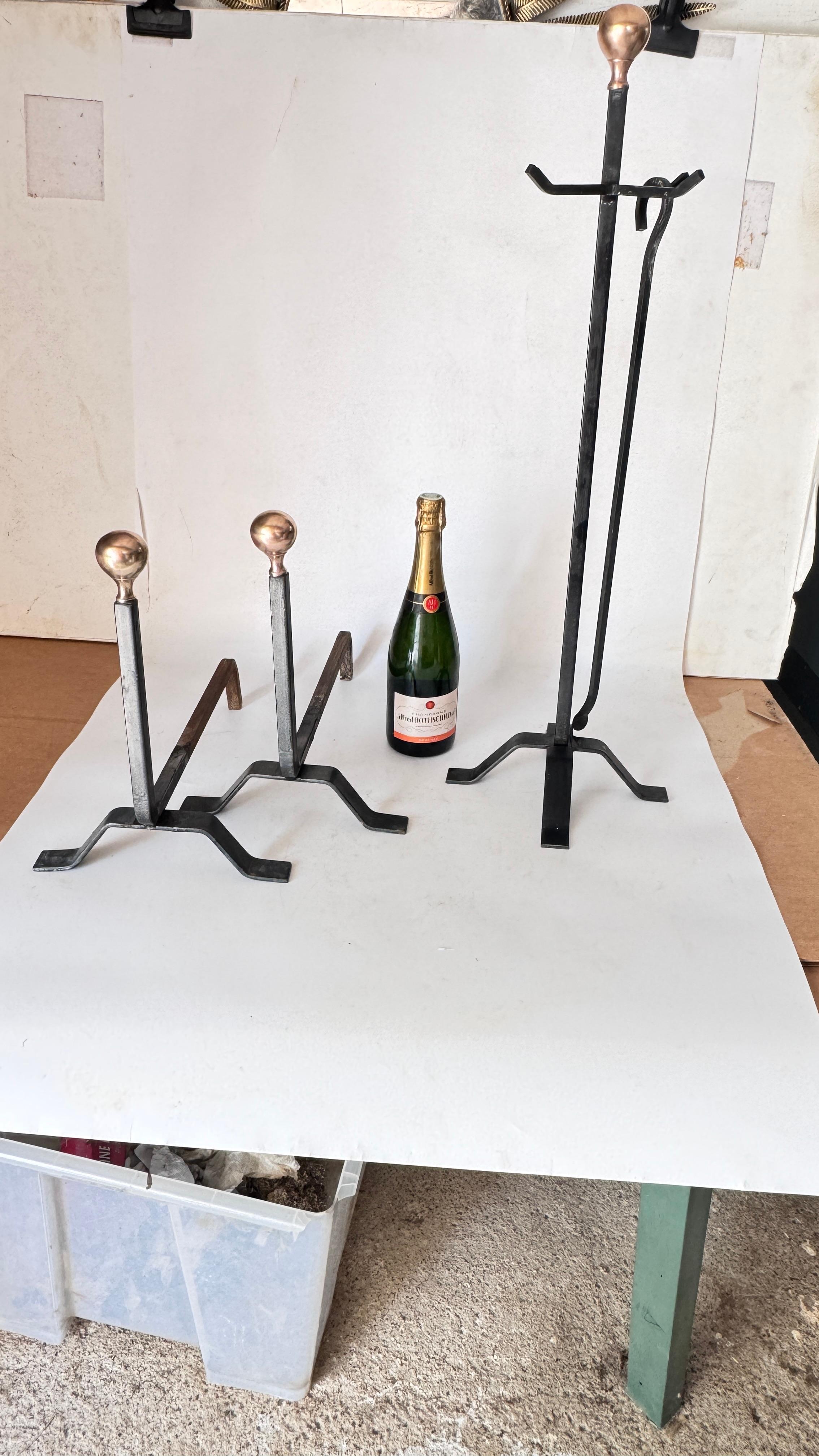 Elegant 1950s French Fireplace Tool Set – Black Cast Iron with Polished Brass Finials

Description:
This refined 1950s French fireplace ensemble is a perfect blend of functionality and minimalist elegance. The set includes two chenets (andirons) and