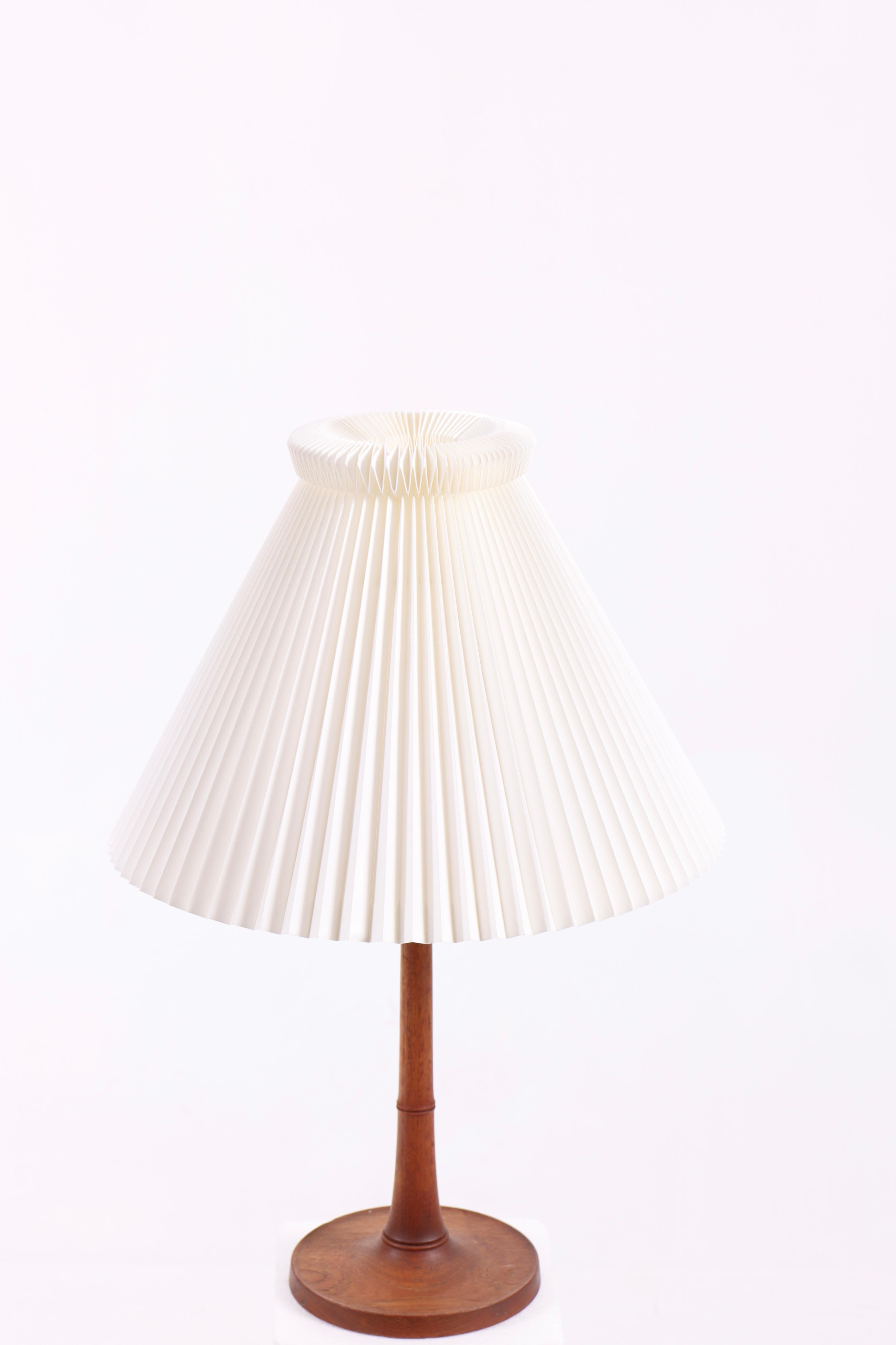 Elegant 1950s Teak Lamp by Leklint with Signature Pleated Shade - Danish Design For Sale 1