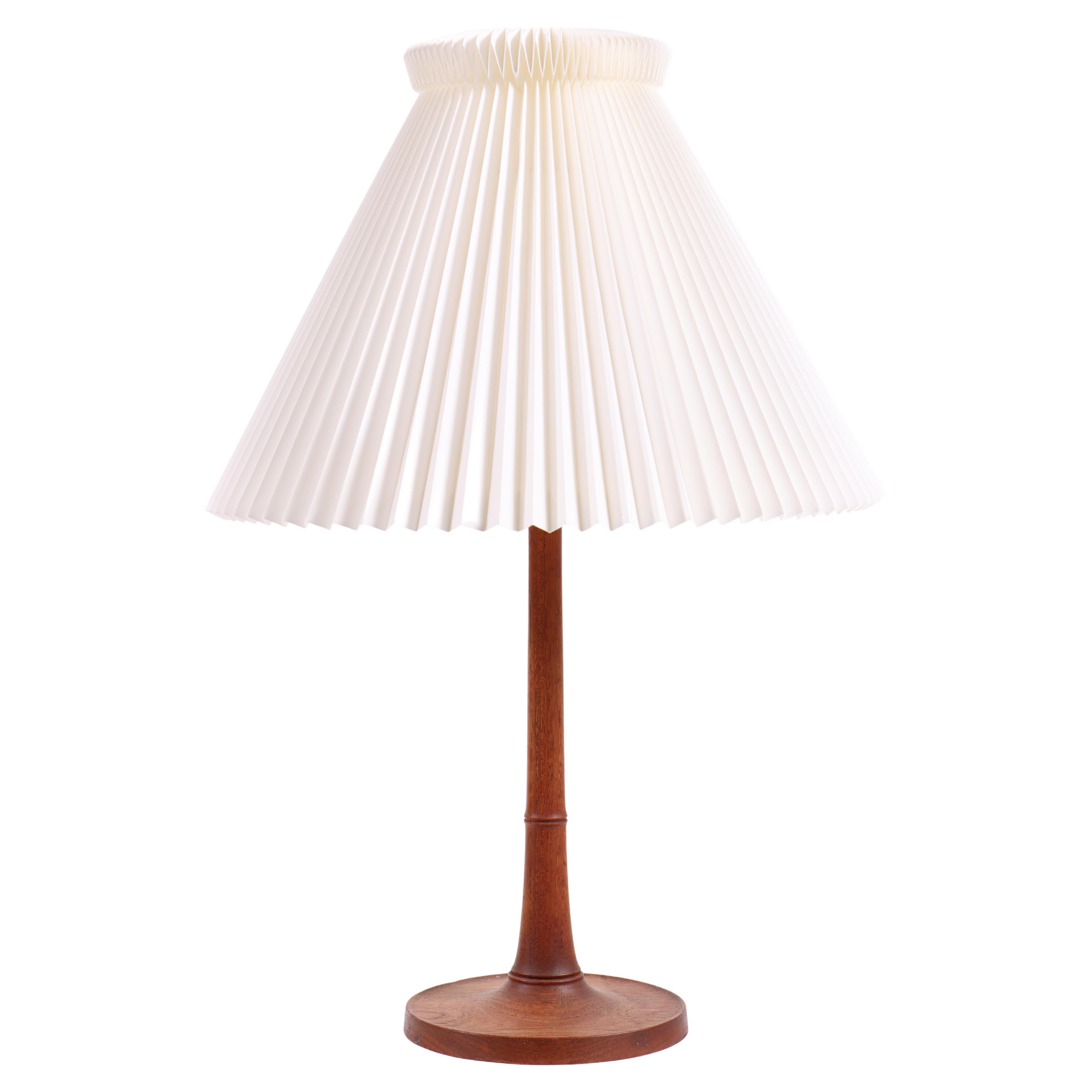 Elegant 1950s Teak Lamp by Leklint with Signature Pleated Shade - Danish Design For Sale