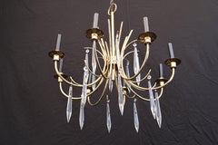Elegant 1960's chandelier in the style of Tommi Parzinger
