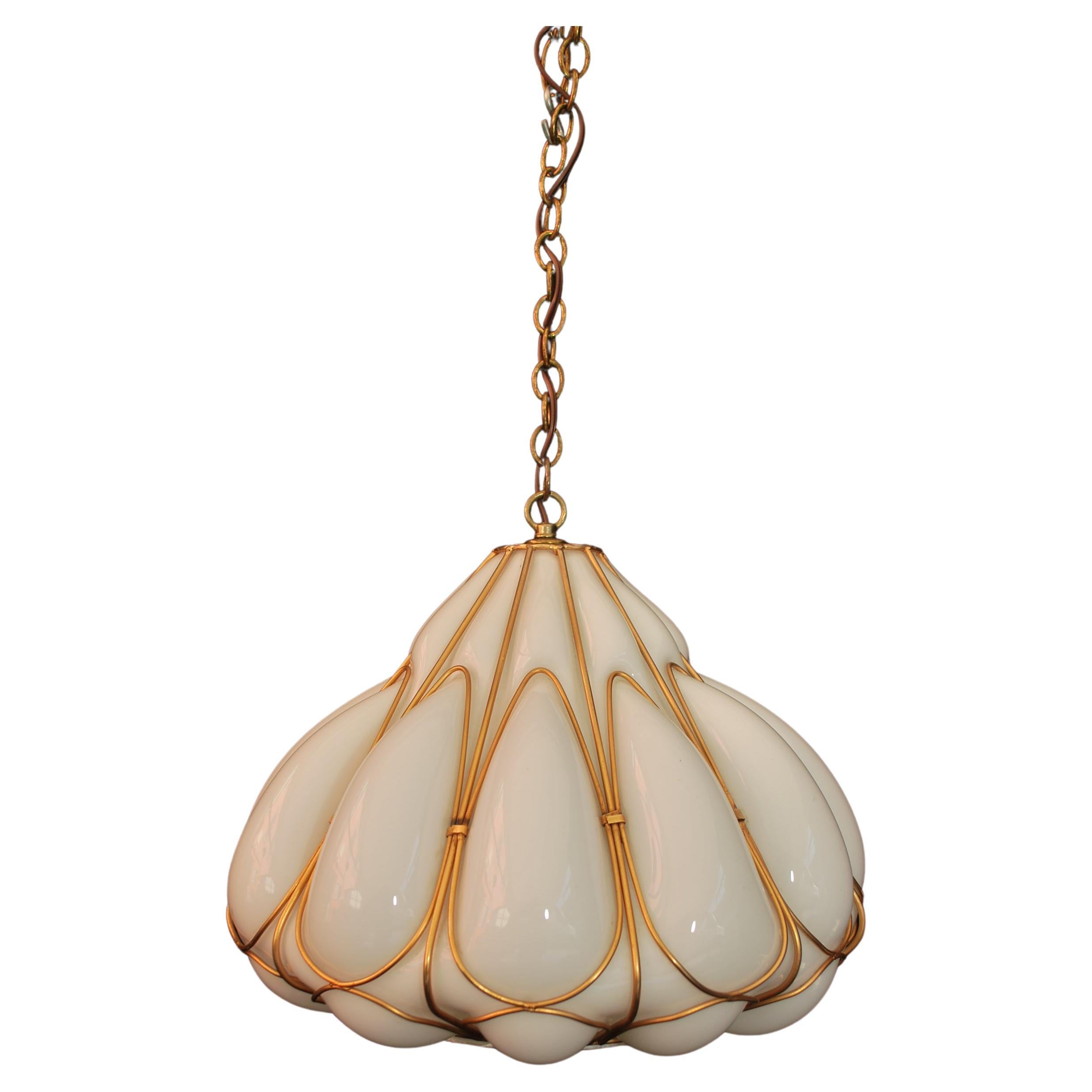 Elegant 1970's Murano glass blown into the iron frame light For Sale