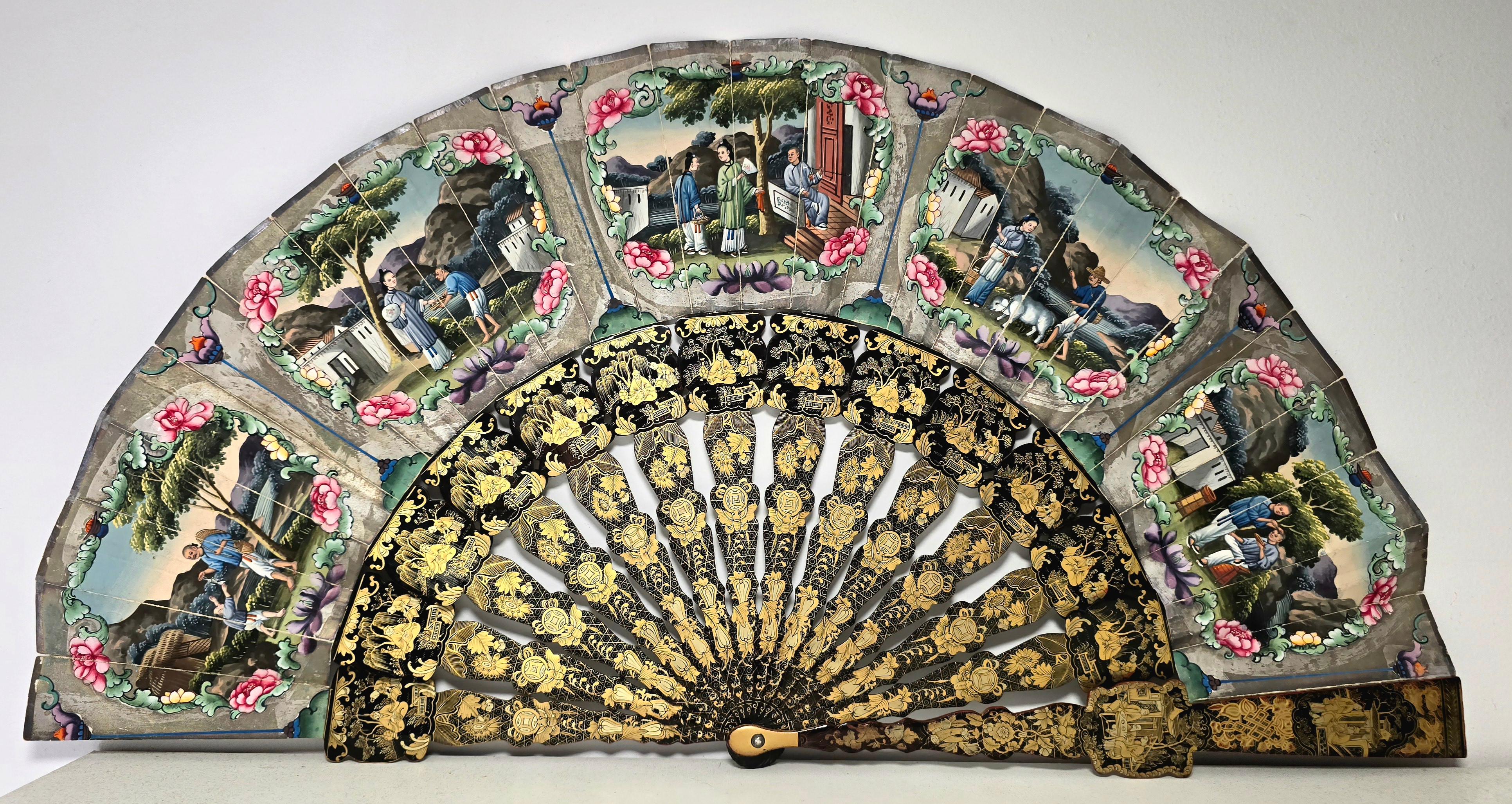This exquisite Filipino fan from the 19th century is a captivating piece, hand-painted with scenes of everyday life. The fan showcases the rich cultural heritage and artistic traditions of the Philippines during the 19th century. With its delicate
