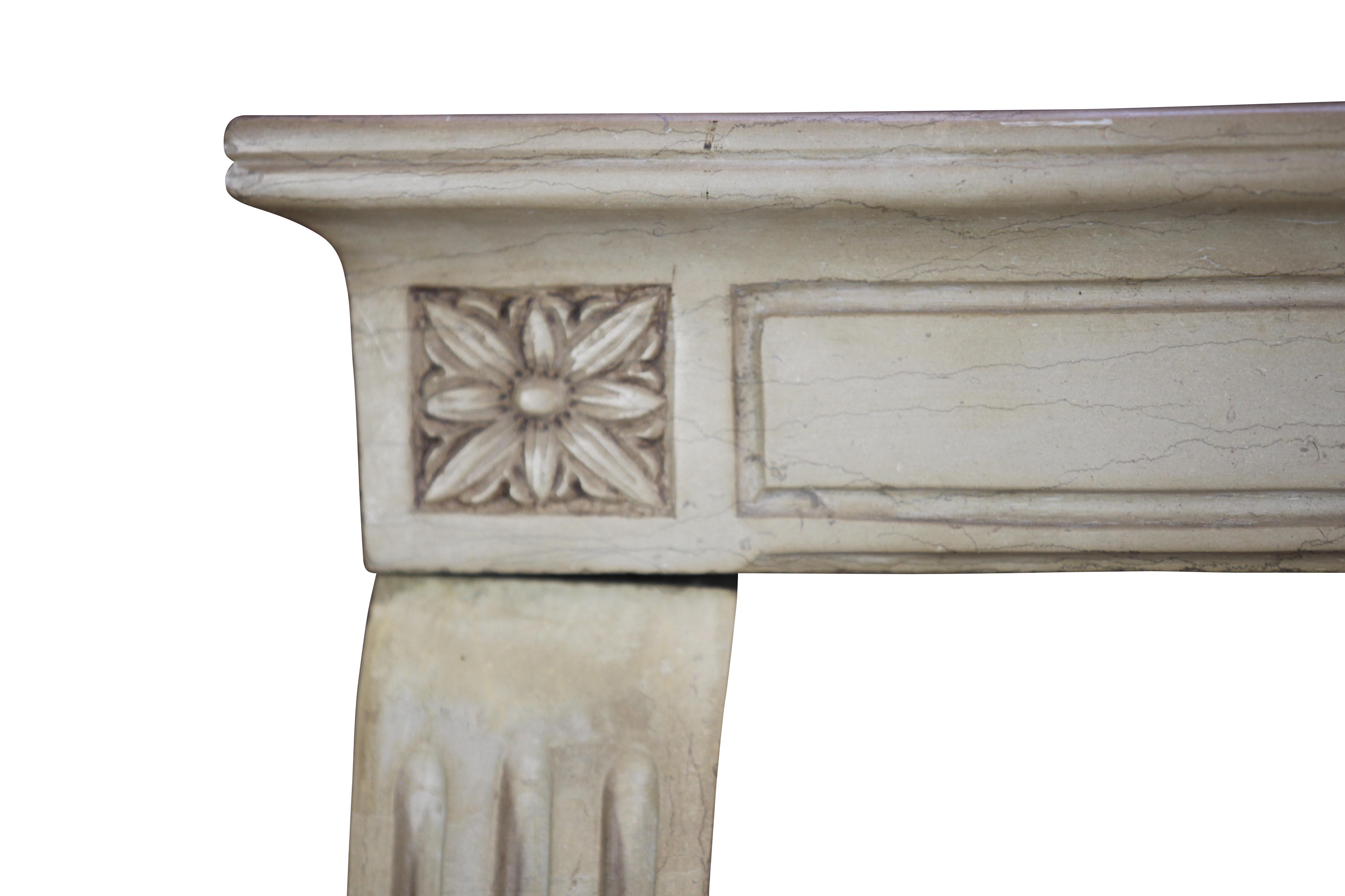 A delicate Louis XVI style, 19th century vintage fireplace surround in a bicolor Burgundy hard stone/marble. Quite an elegant mantle.
Measures:
116 cm exterior width 45.67 inch
95 cm exterior height 37.4 inch
95 cm interior width 37.4 inch
86