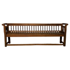 Elegant 19th-Century Walnut Bench with Finely Carved Backrest and Armrests