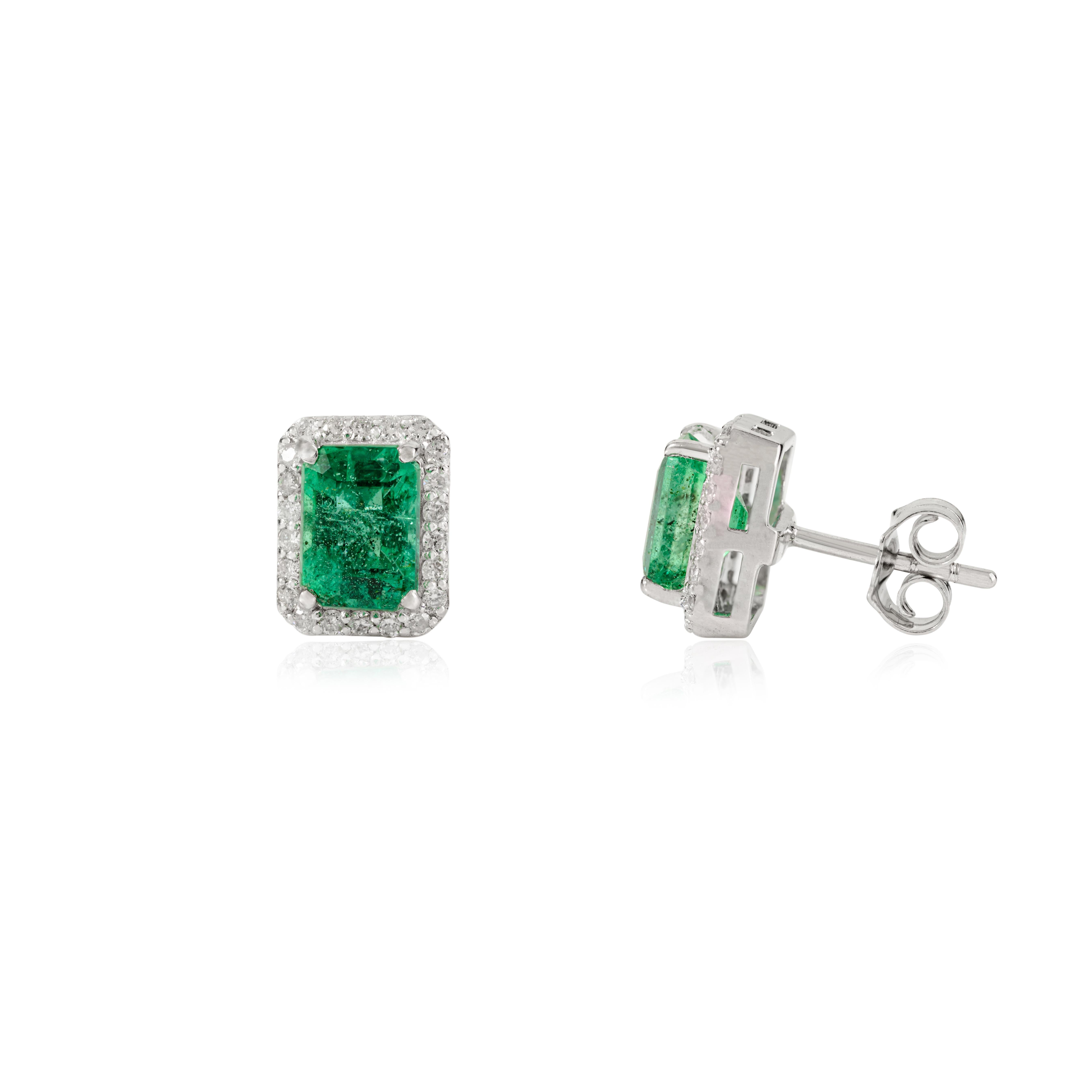 Elegant 2.09Ct Emerald-Cut Emerald and Diamond Halo Stud Earrings 14k White Gold For Sale 1