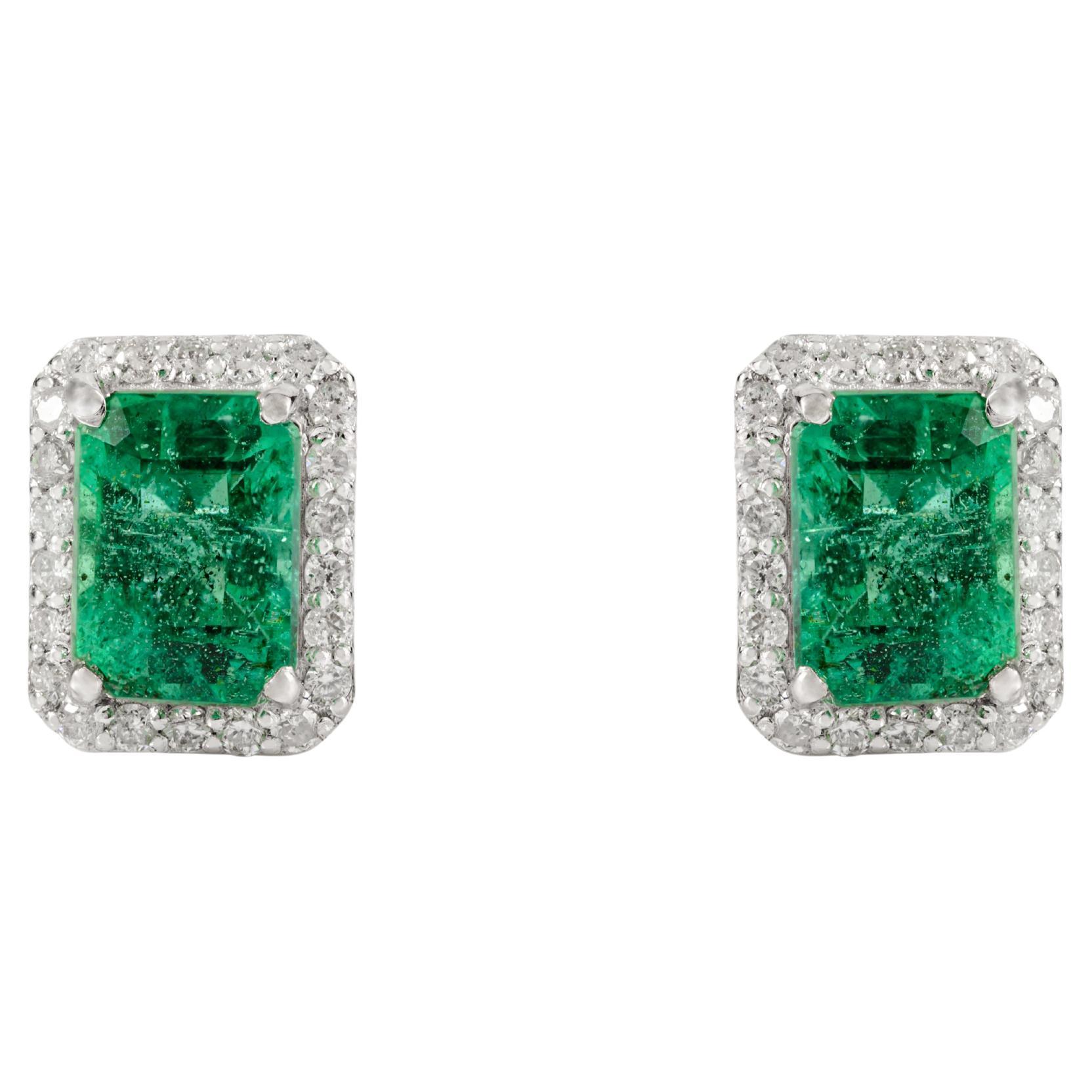 Elegant 2.09Ct Emerald-Cut Emerald and Diamond Halo Stud Earrings 14k White Gold For Sale
