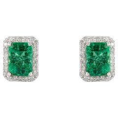 Elegant 2.09Ct Emerald-Cut Emerald and Diamond Halo Stud Earrings 14k White Gold