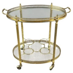 Elegant 20th Century Brass and Glass Rolling Table with Gallery