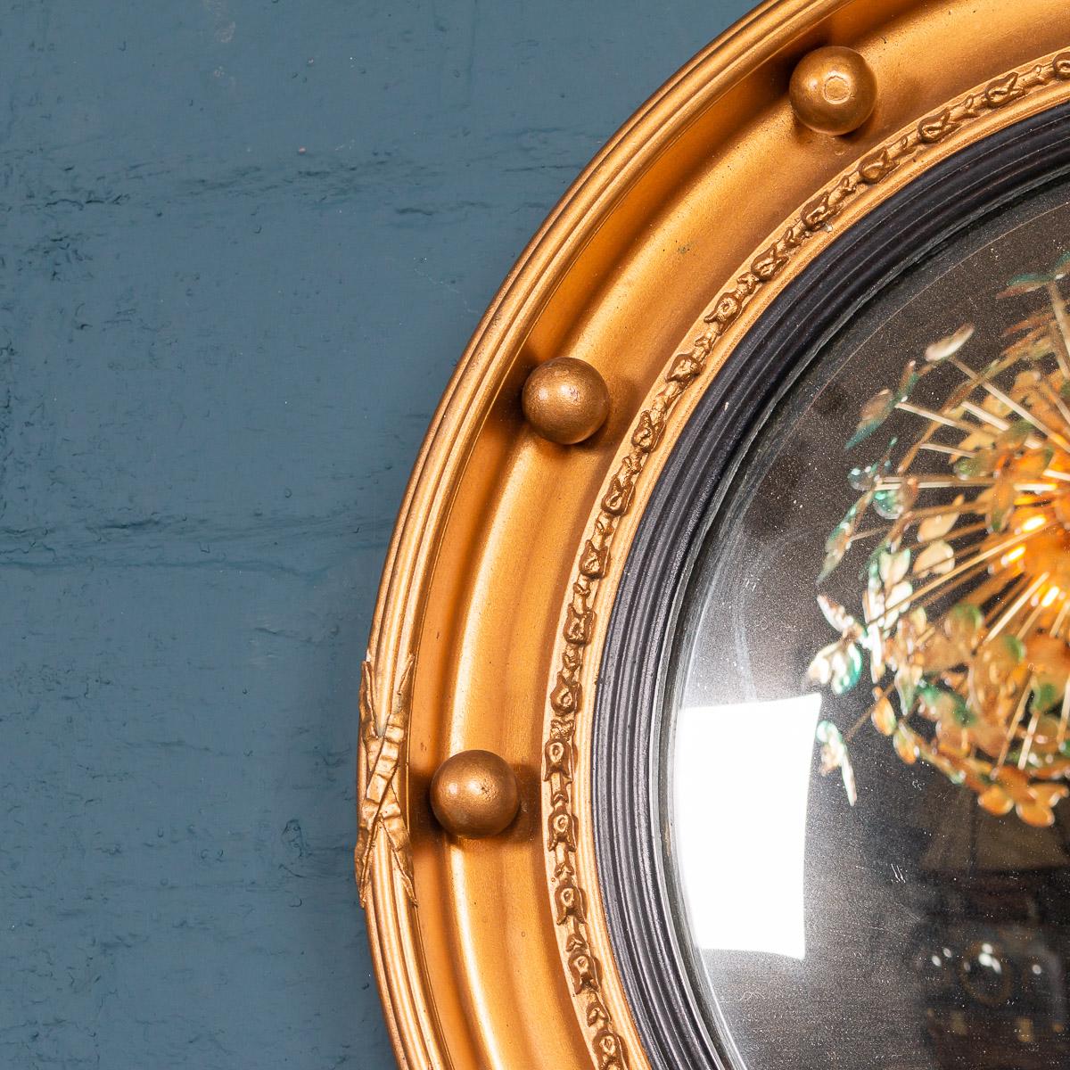 A collection of five mid-20th century convex mirrors in wood and plaster. Convex mirrors played an important role in the running of the Regency household. Often placed in the dining room, the convex mirror allowed the butler to oversee the progress