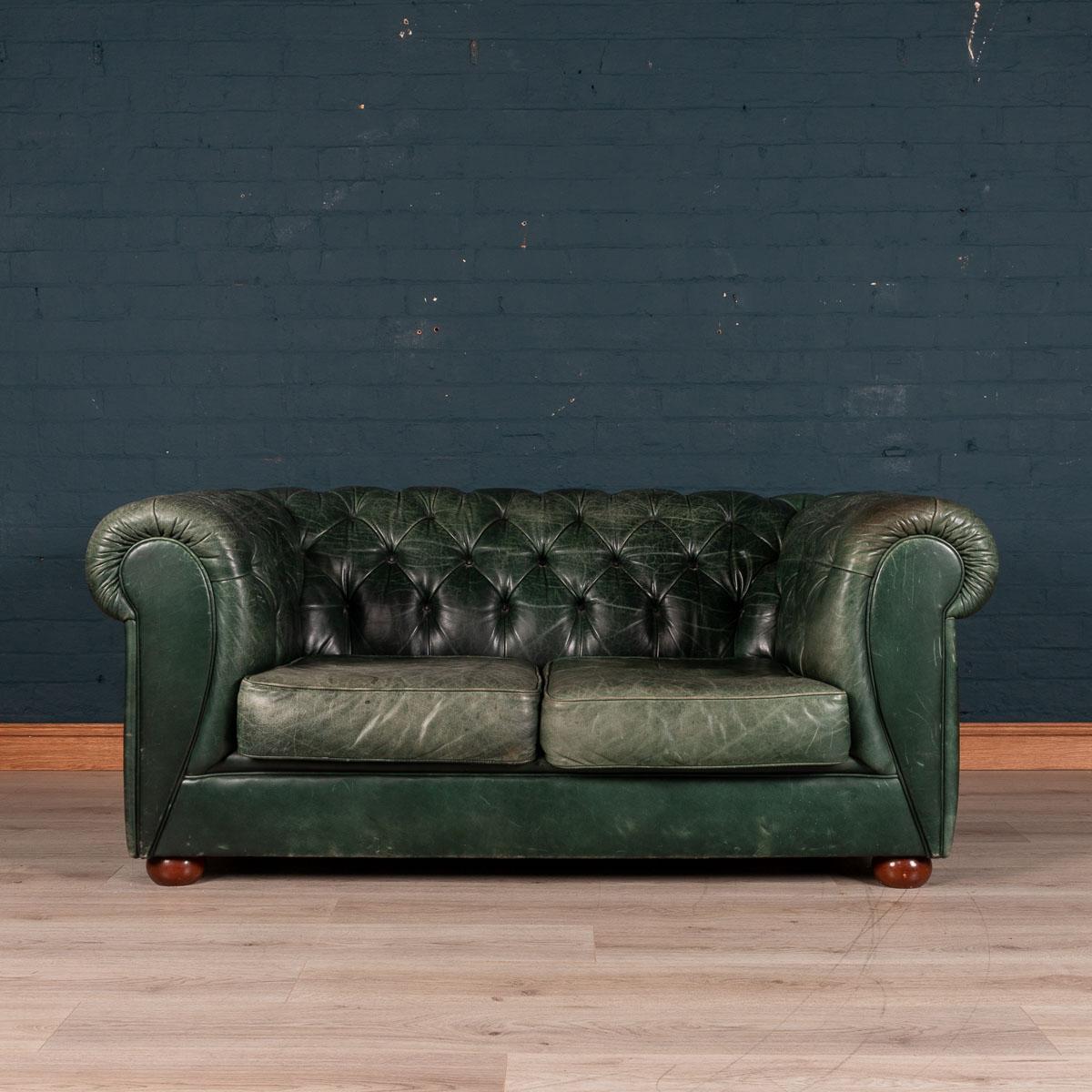 Pair of late 20th century two-seat leather Chesterfield sofas of superb quality, hand dyed leather.

  