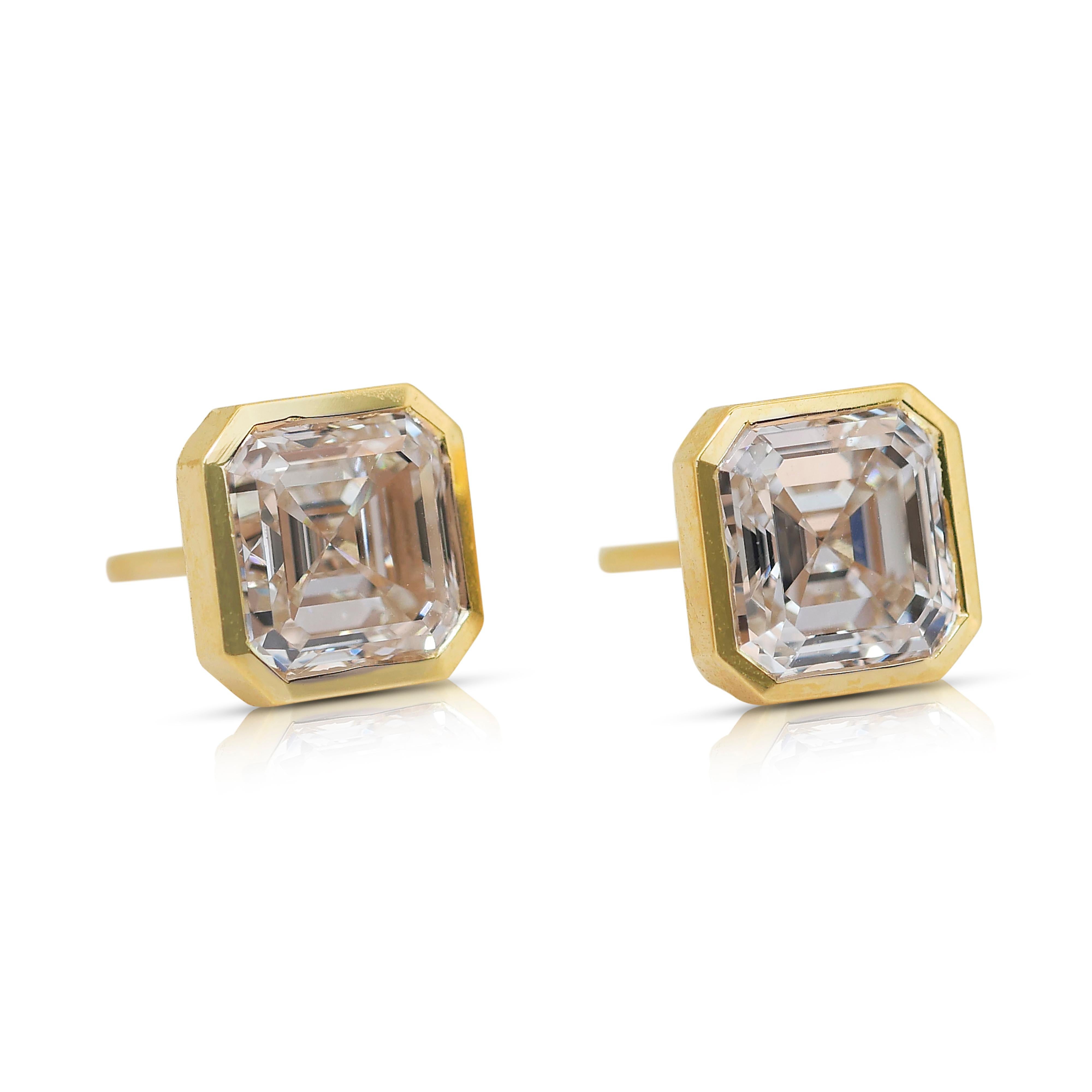 Elegant 3.03ct Diamonds Stud Earrings in 18k Yellow Gold - IGI Certified
 
Elevate your style with these 18K yellow gold diamond stud earrings, showcasing two stunning square-cut diamonds with a 3.03ct total. Their precision cut enhances brilliance,