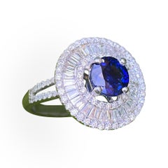 Elegant 4.04 Carat Sapphire and Diamond Ballerina Design White Gold Ring