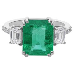Elegant 4.10Ct Emerald and Diamond Halo Engagement Ring In 18k White Gold