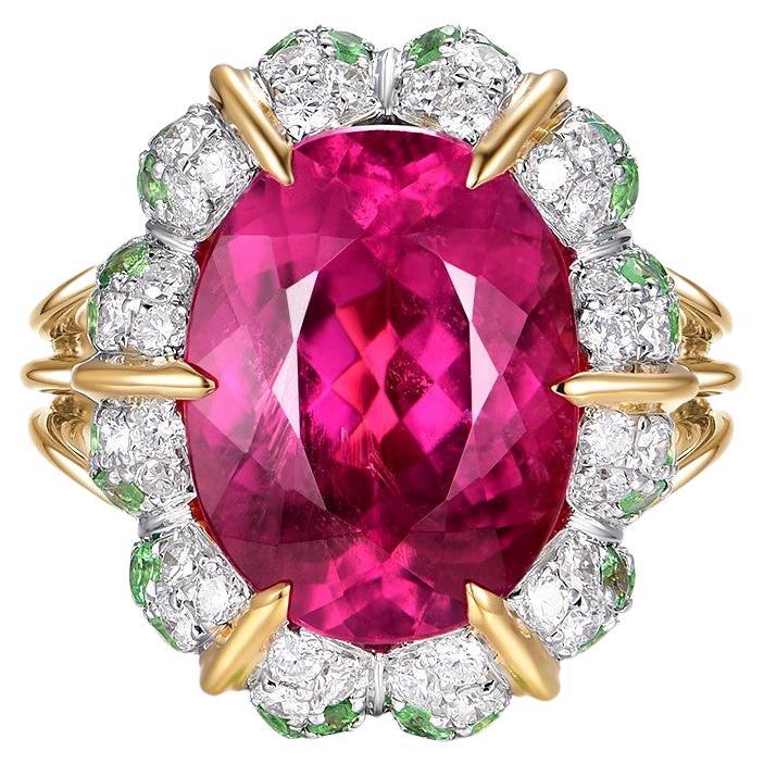 This ring is a masterful creation of 18-karat yellow gold, centered with a striking rubellite weighing 6.18 carats. The rubellite, a variety of tourmaline, boasts an intense pinkish-red hue that is both vibrant and deep, capturing the essence of its
