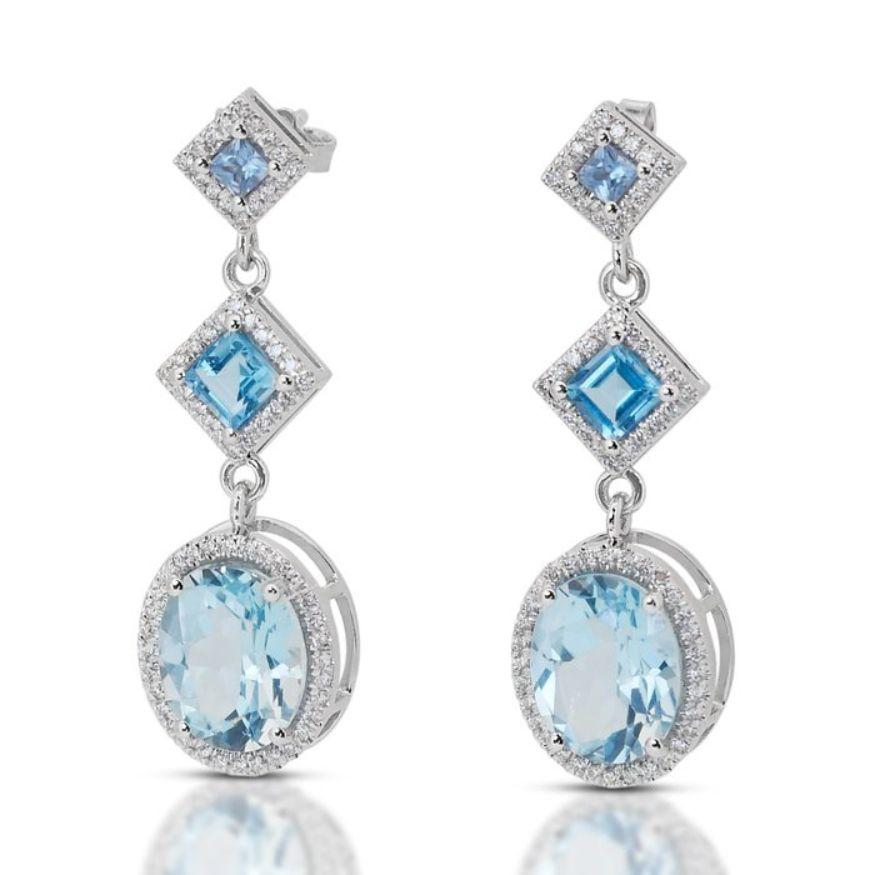 Élégantes boucles d'oreilles en or blanc 14 carats avec topaze ovale de 7,02 carats de taille mixte en vente 1