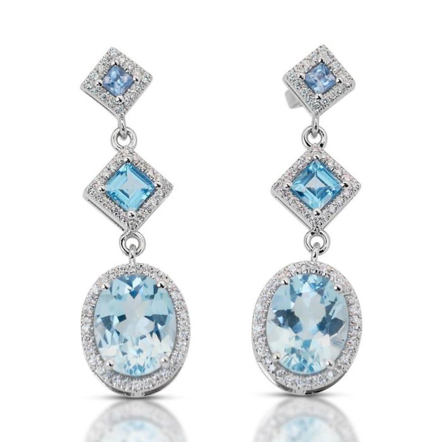Élégantes boucles d'oreilles en or blanc 14 carats avec topaze ovale de 7,02 carats de taille mixte en vente 2
