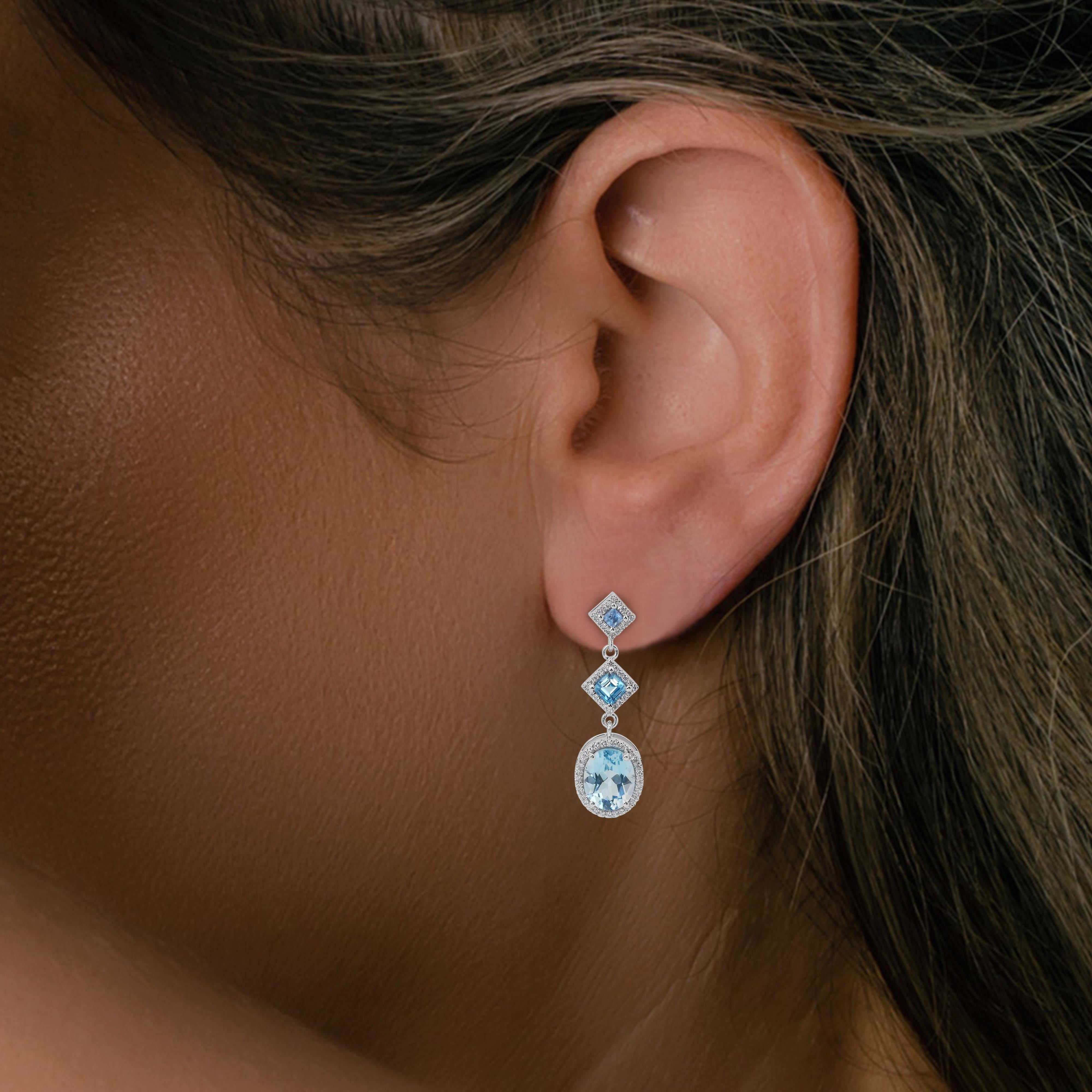 Élégantes boucles d'oreilles en or blanc 14 carats avec topaze ovale de 7,02 carats de taille mixte en vente 3