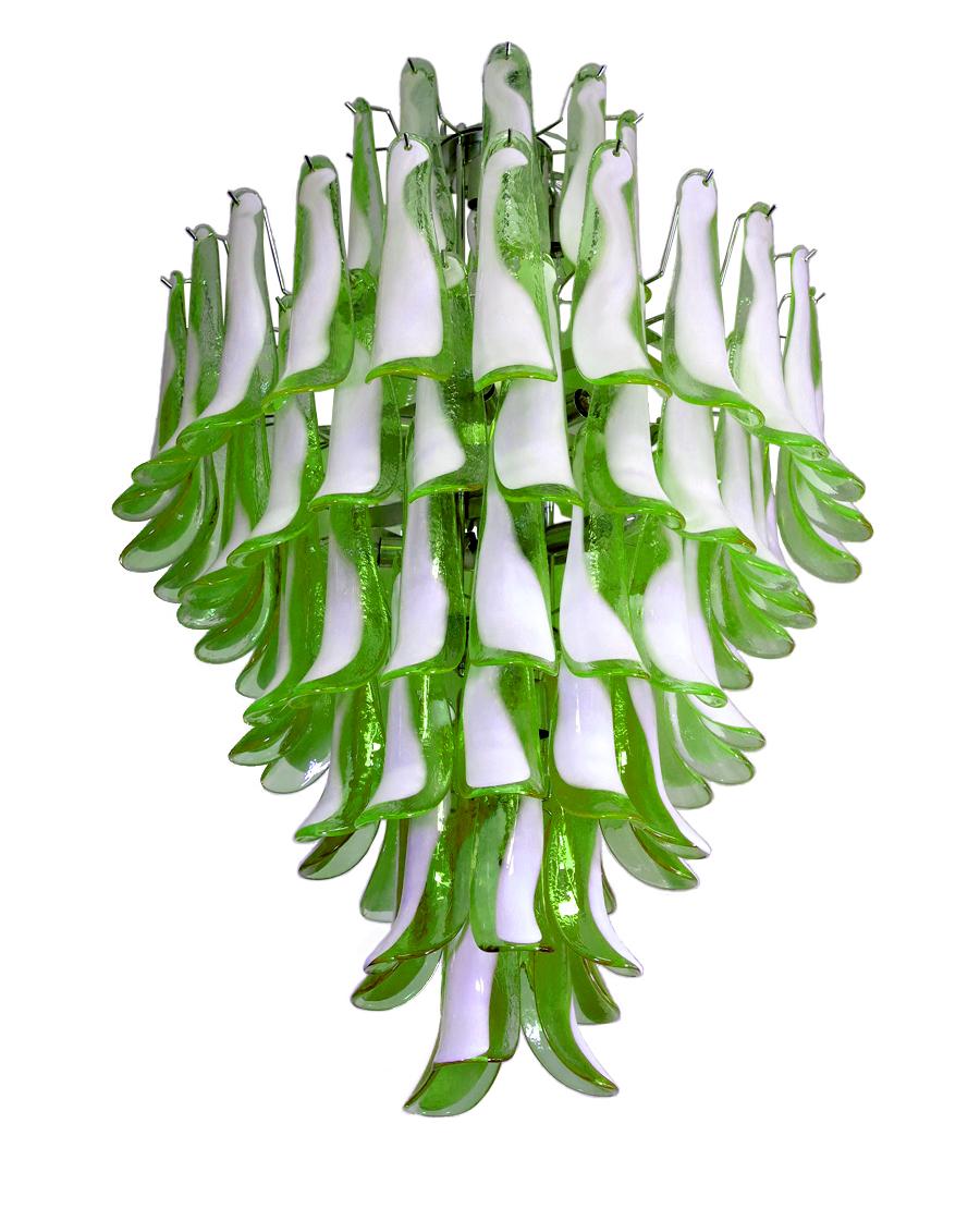 Handblown glass chandelier, composed of 84 curved glass pieces, which are arranged on seven tiers, suspended from a nickel metal structure. Available in different colors!
Dimensions: 47.25 inches (120 cm) height without chain; 31.50 inches (80 cm)
