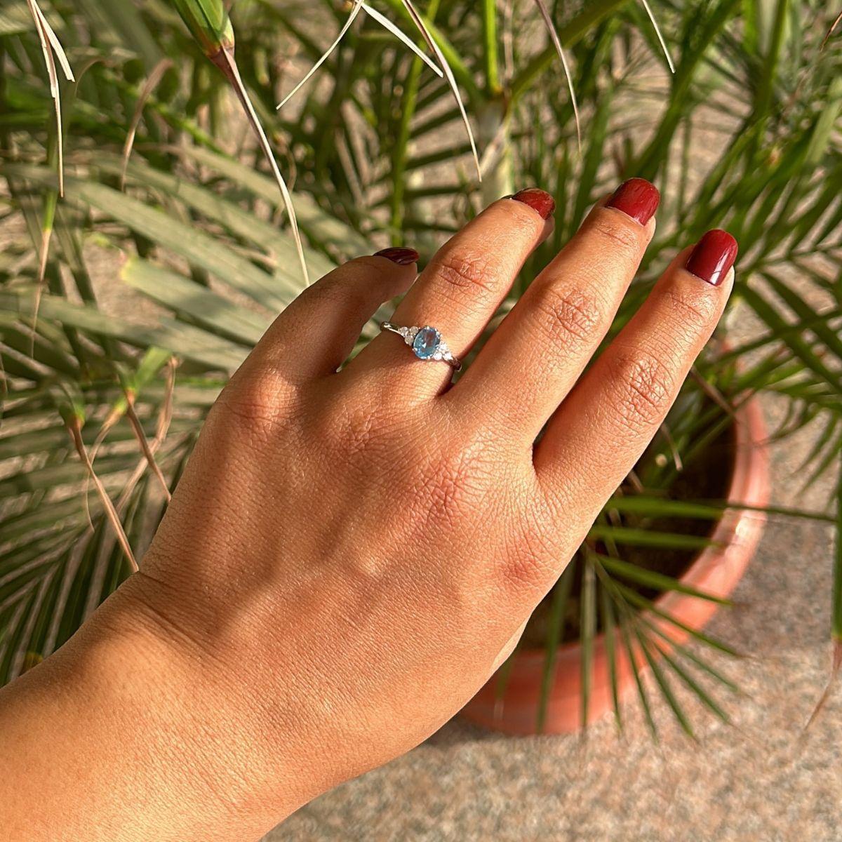 For Sale:  Elegant 925 Sterling Silver Ring with Blue Topaz & Sparkling CZ Accents for Her 2