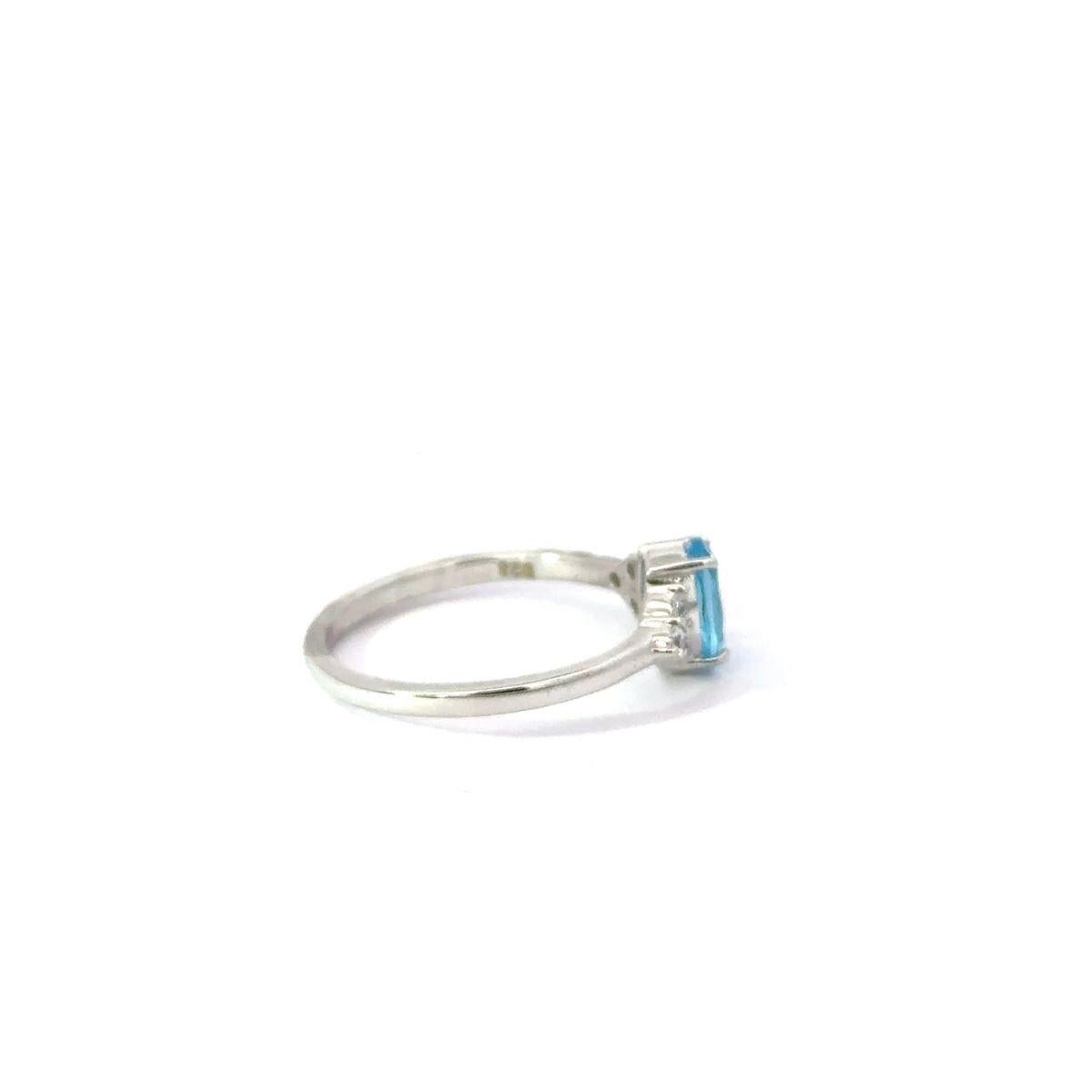 For Sale:  Elegant 925 Sterling Silver Ring with Blue Topaz & Sparkling CZ Accents for Her 3