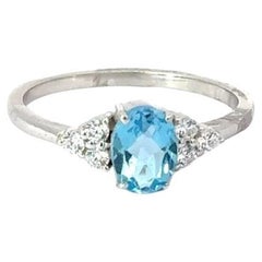 Élégante bague en argent sterling 925 avec topaze bleue et touches de CZ scintillantes pour mère